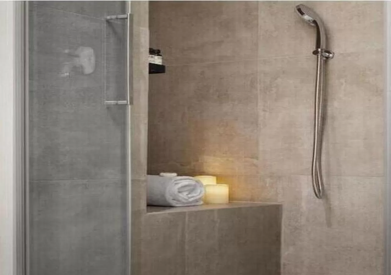 Bathroom in BB Hotels Aparthotel Collection Il Michelangelo