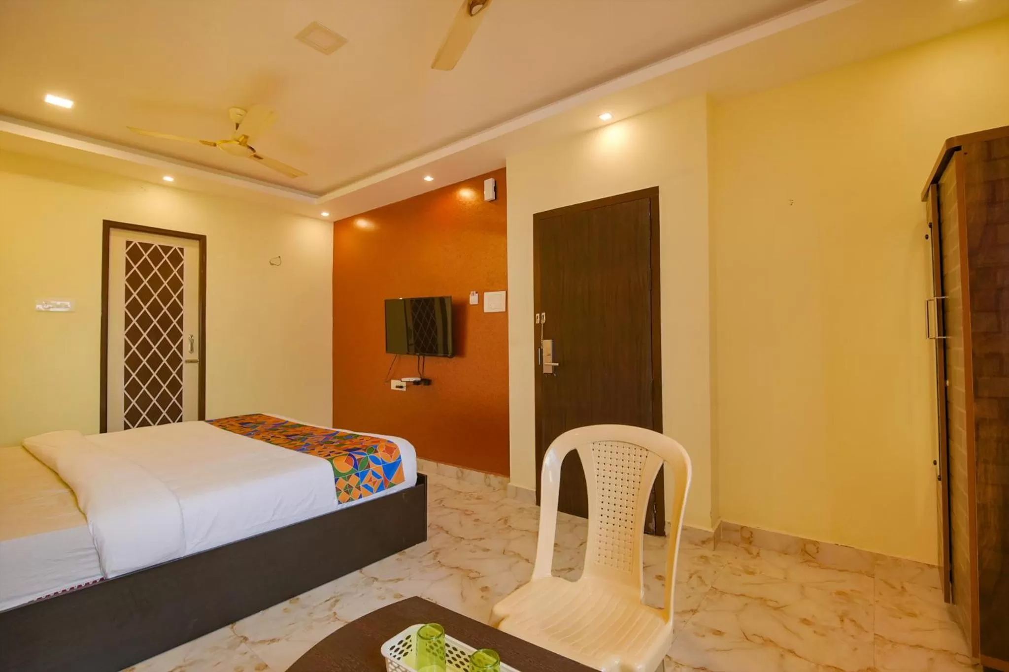 Bed in FabHotel The Fortune Inn