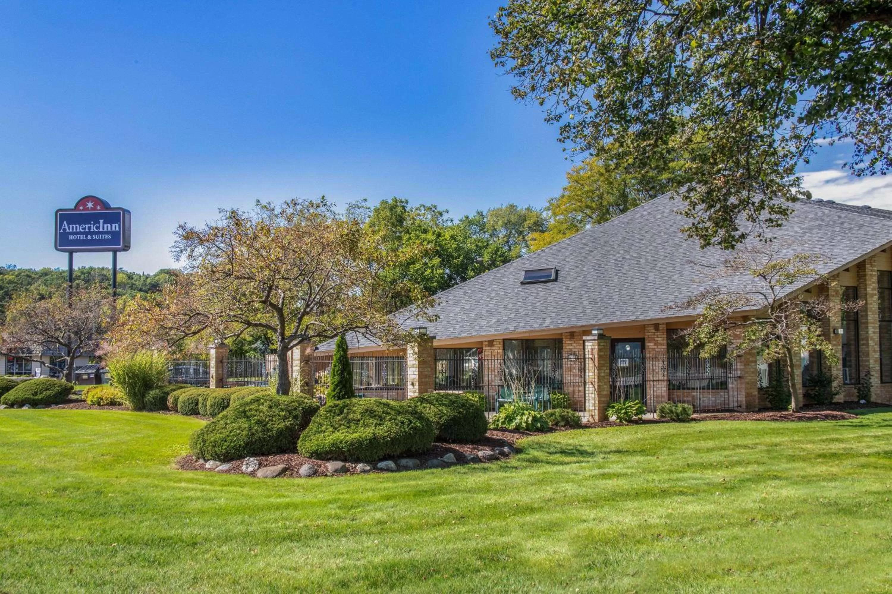 Property building in AmericInn and Suites by Wyndham Delafield-Waukesha-Milwaukee