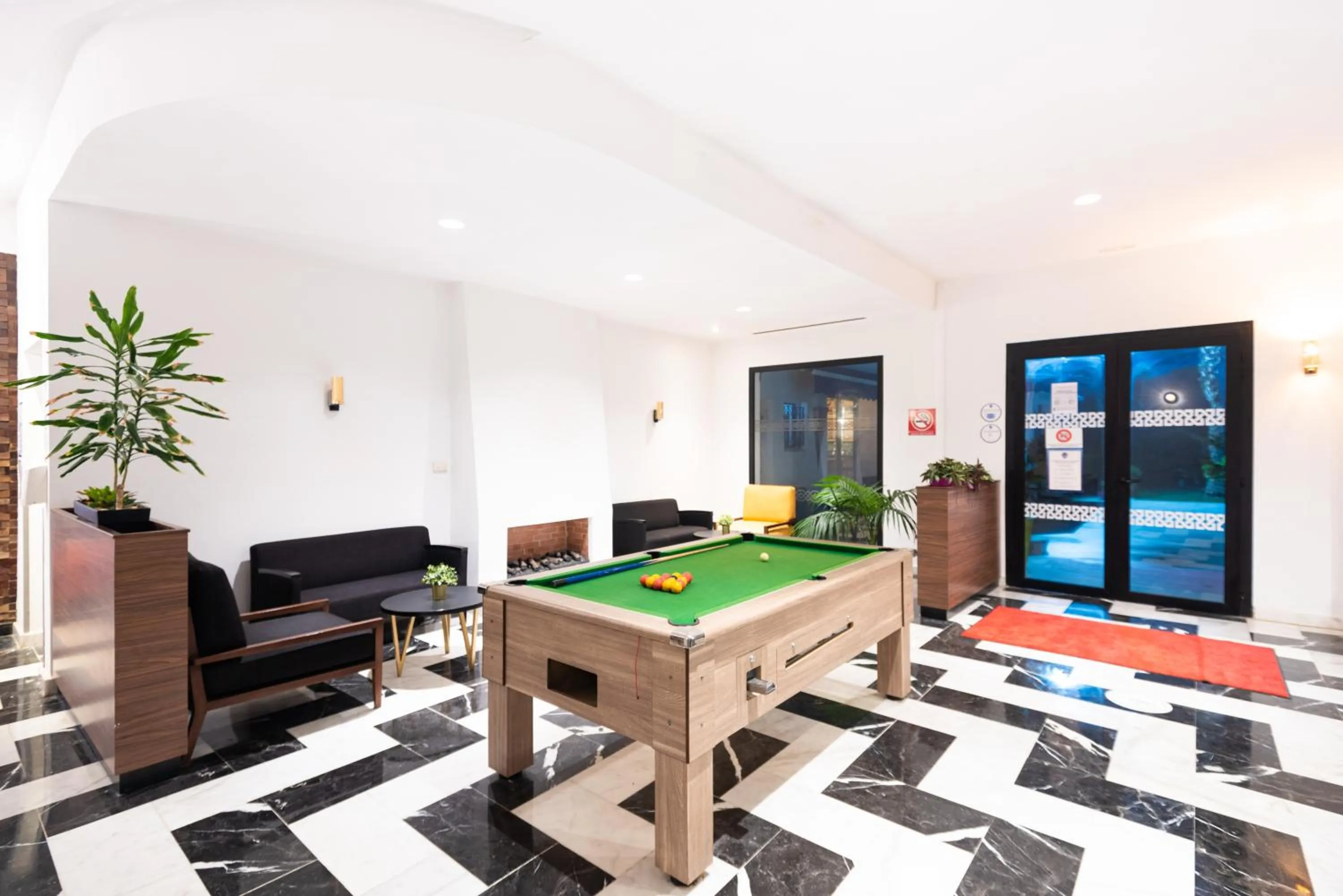 Communal lounge/ TV room in Ibis Meknès