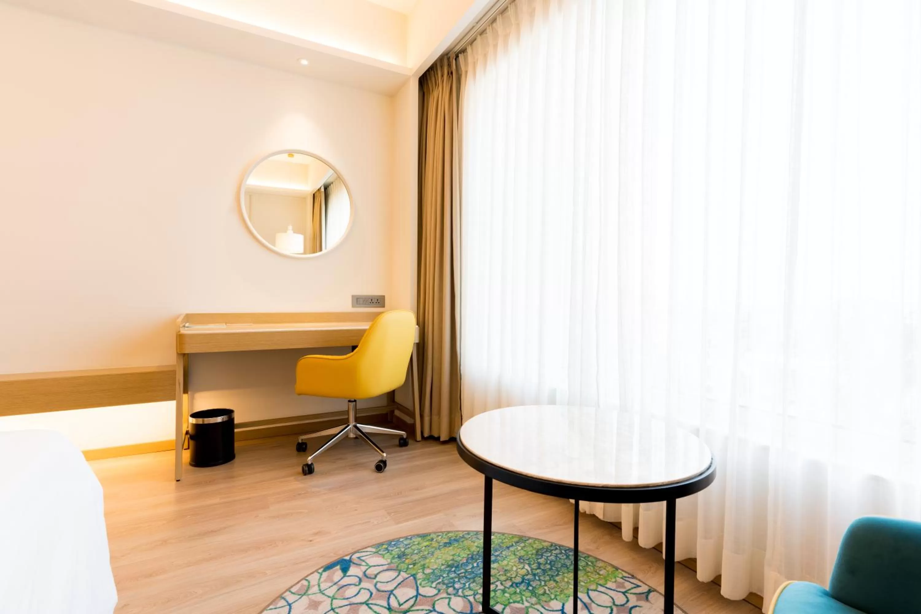 Seating area in Holiday Inn Lucknow Airport by IHG