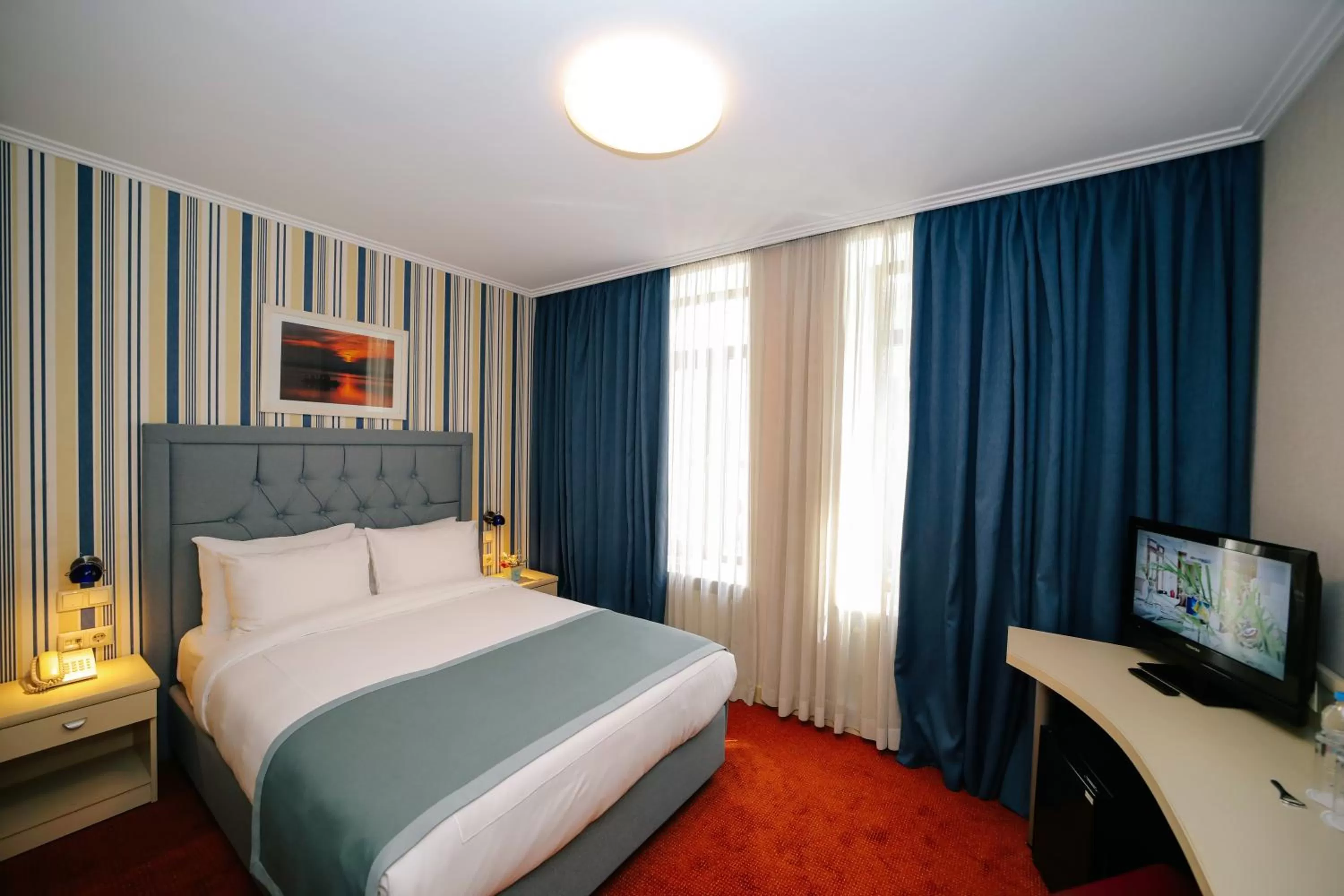 Bed in Sharden Villa Boutique Hotel