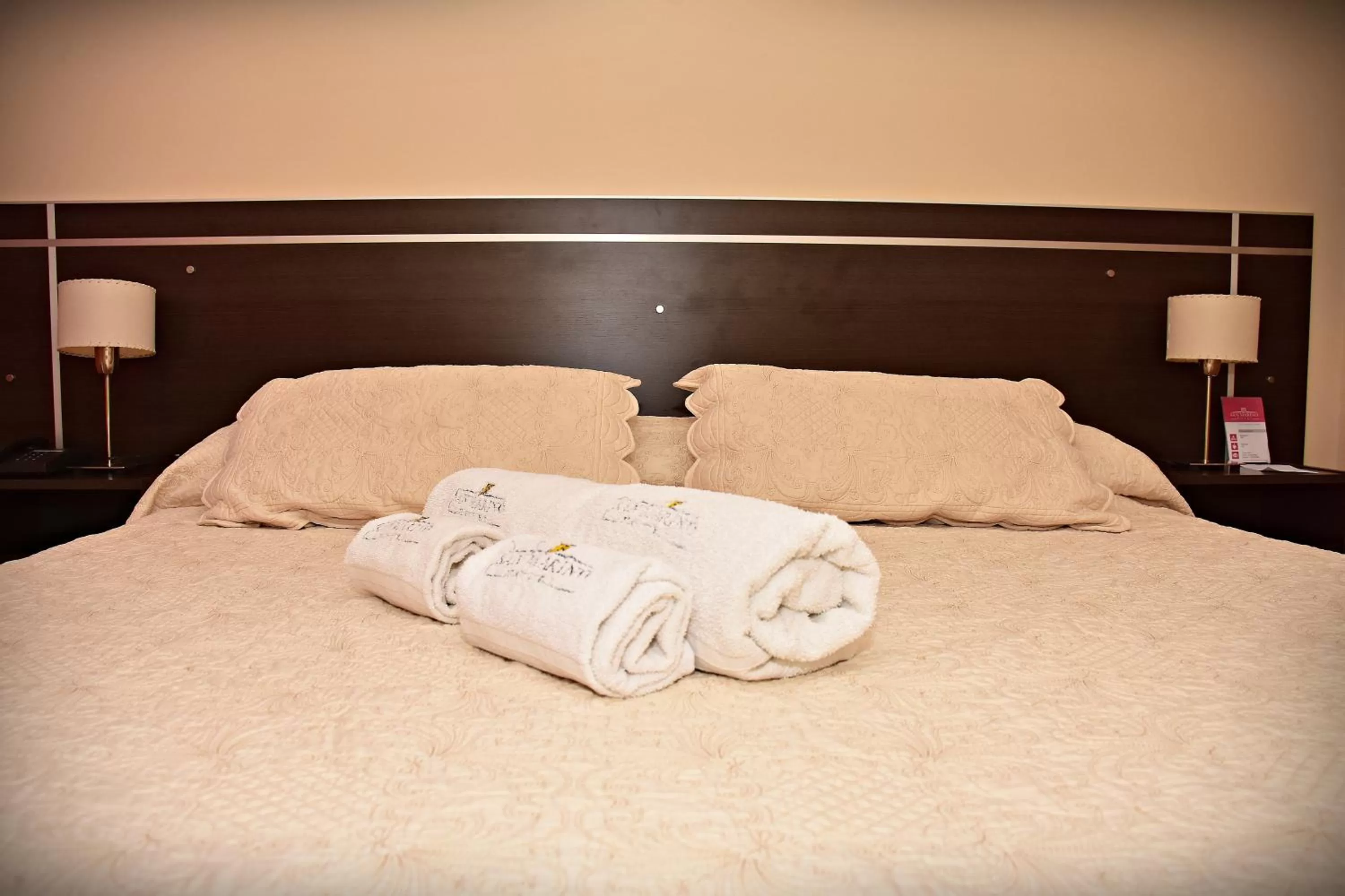 Bed in Hotel San Marino