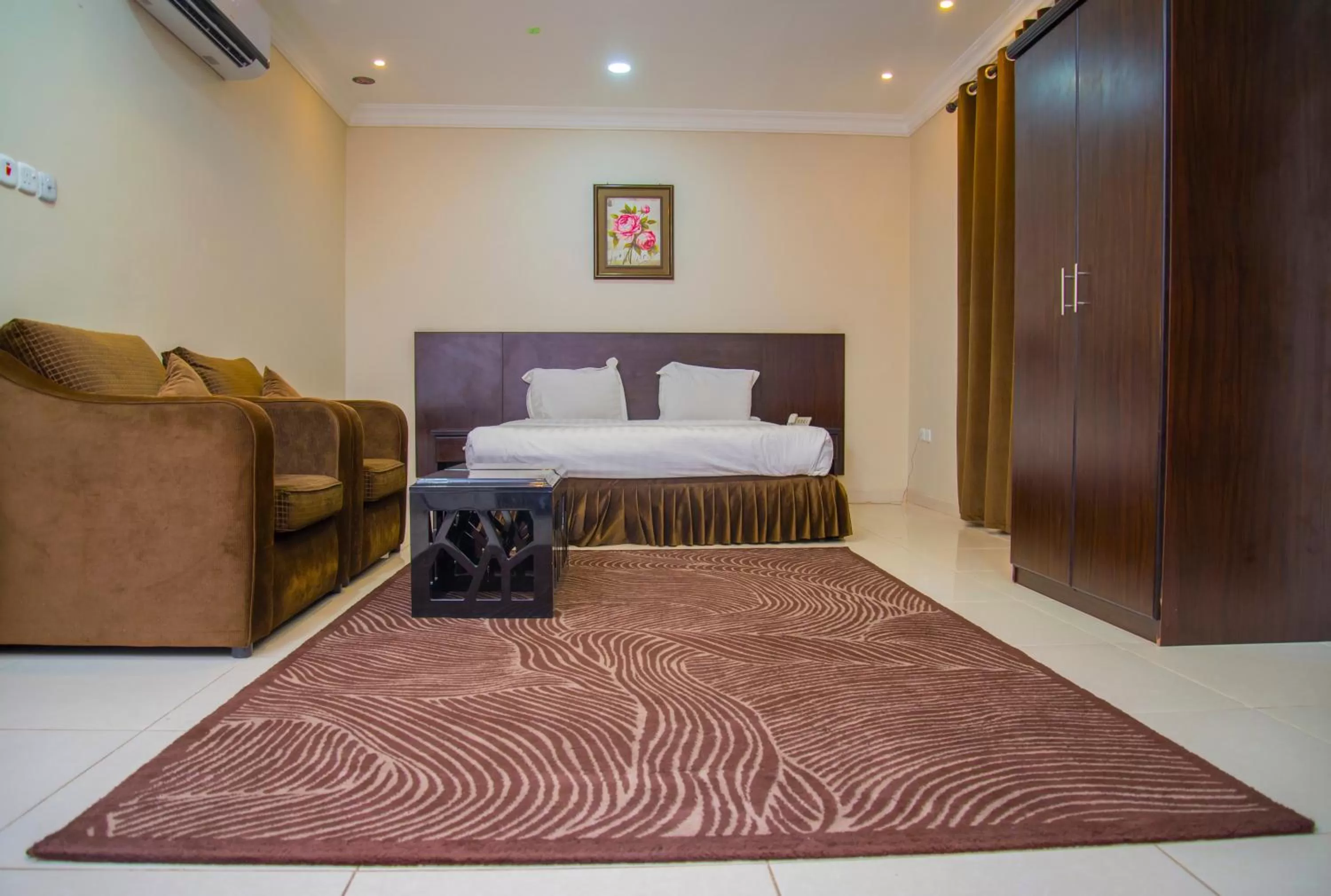 Bedroom, Bed in Shams Suites Furnished Units