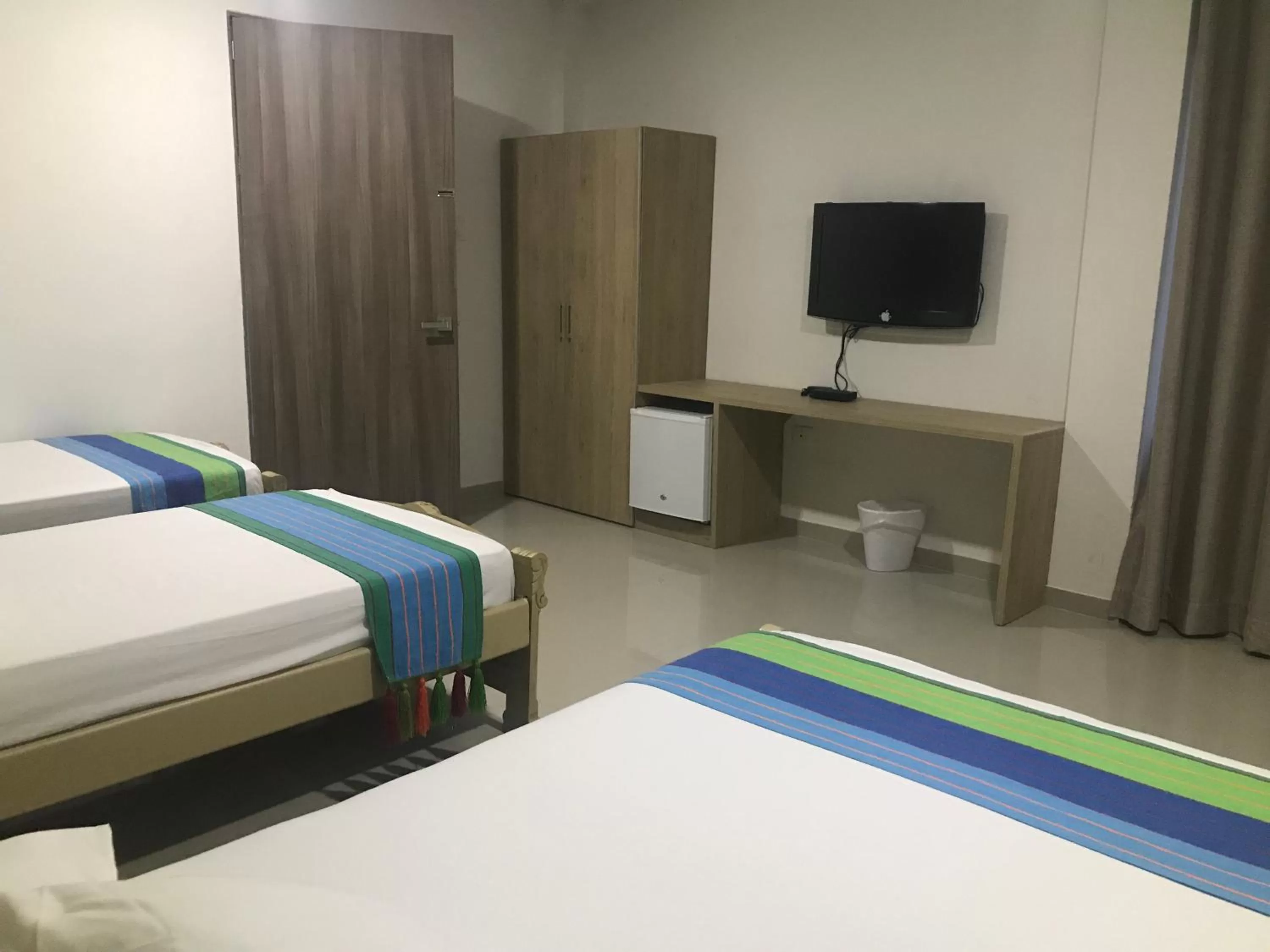 TV and multimedia, Bed in Hotel Emerawaa