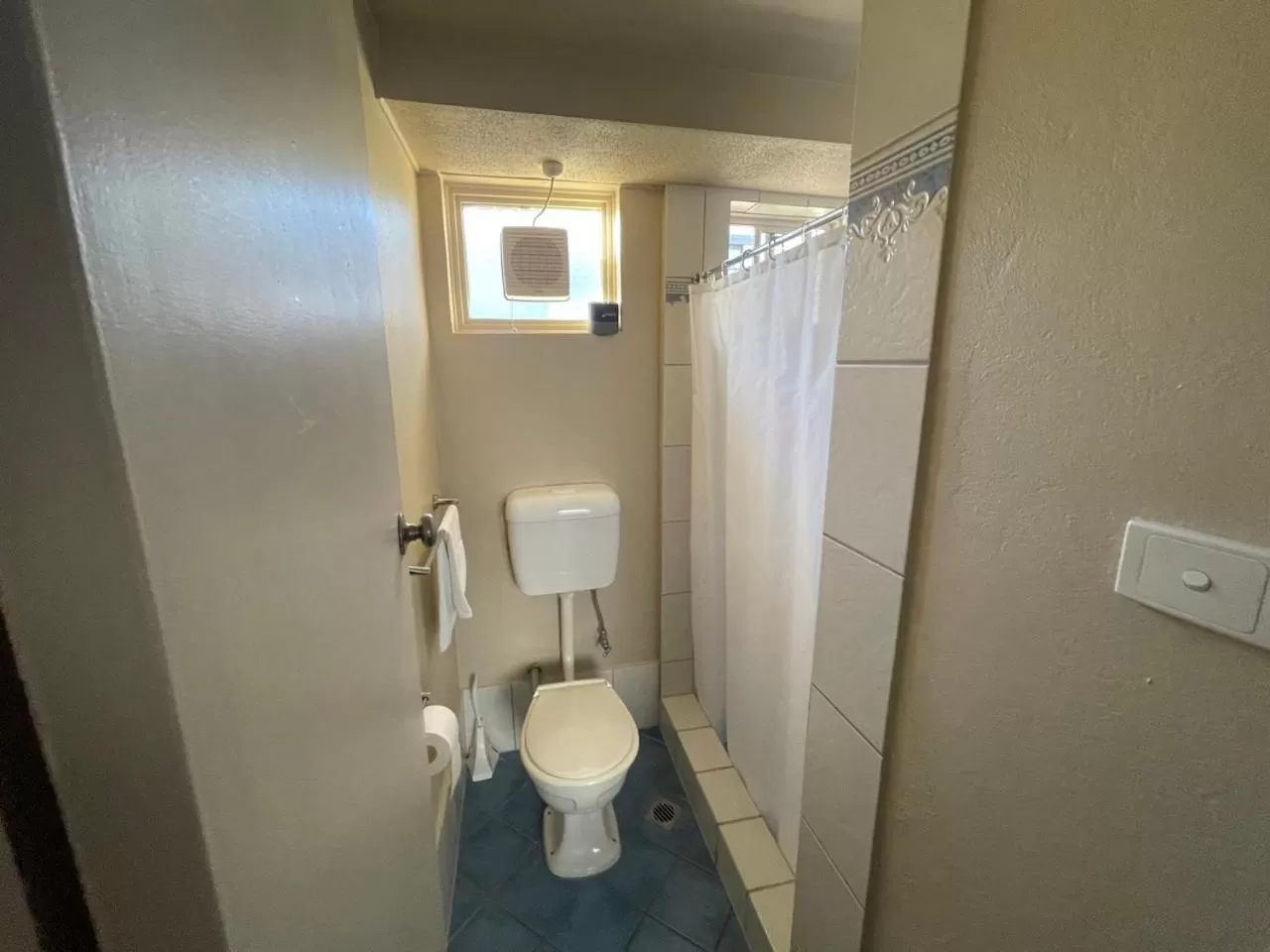 Toilet in Astor Hotel Motel