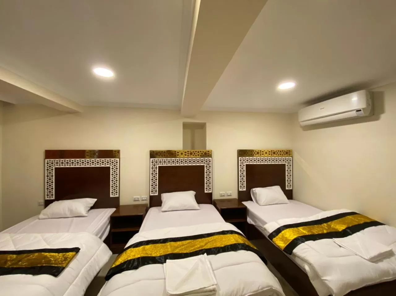 Bed in Pyramids Height Hotel & Pyramids Master Scene Rooftop