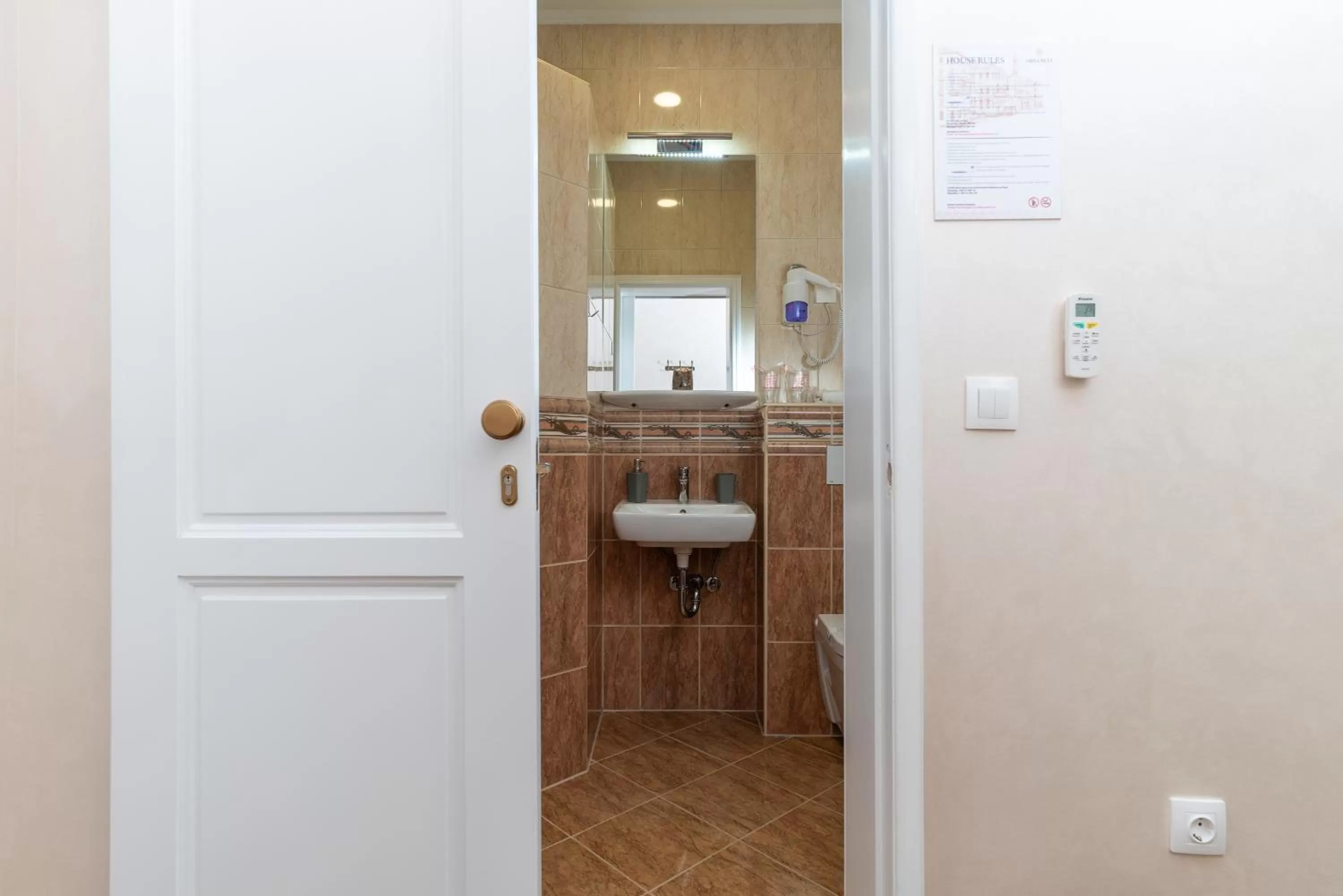 Toilet in Ornament Hotel