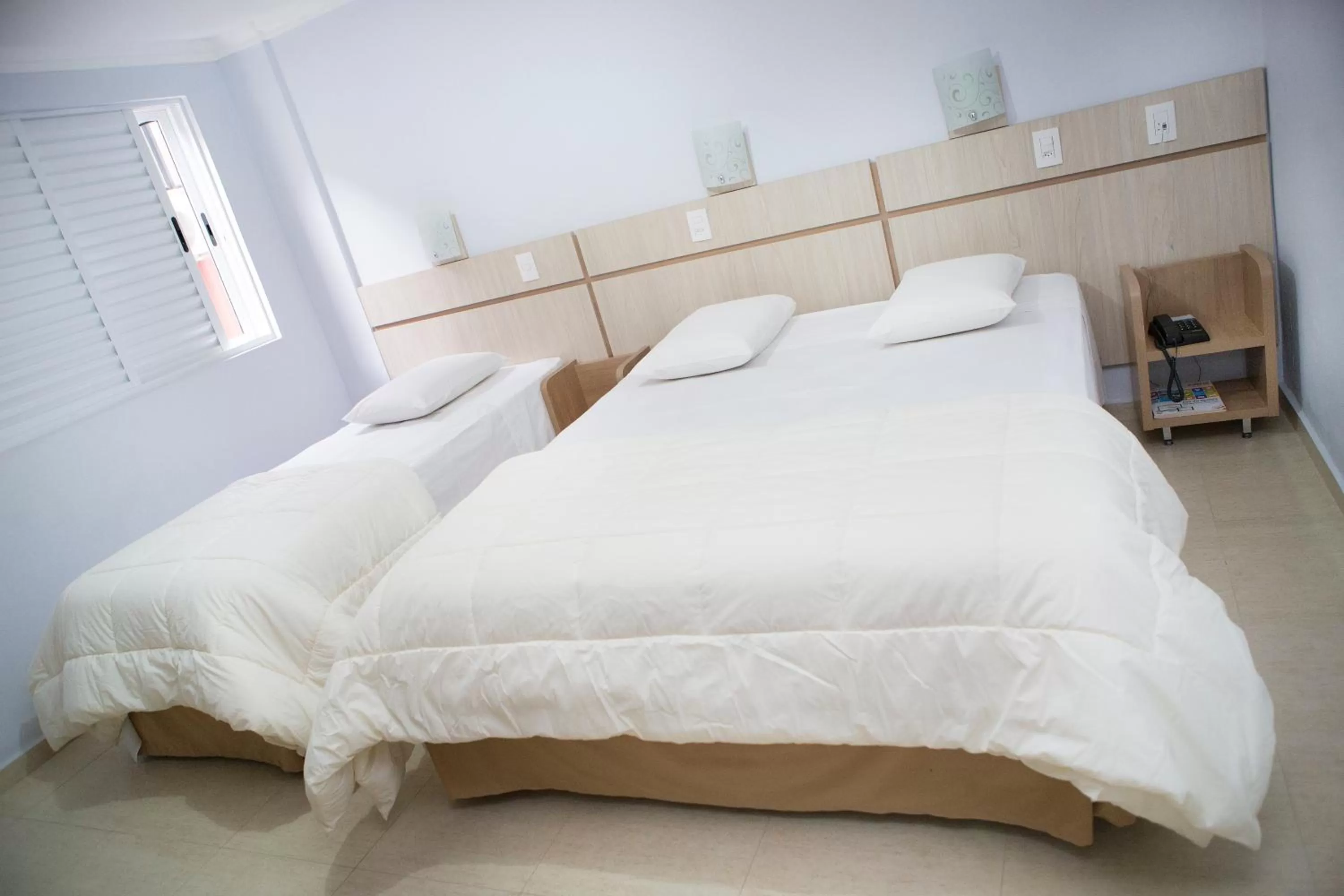 Bed in Hotel Baviera Iguassu