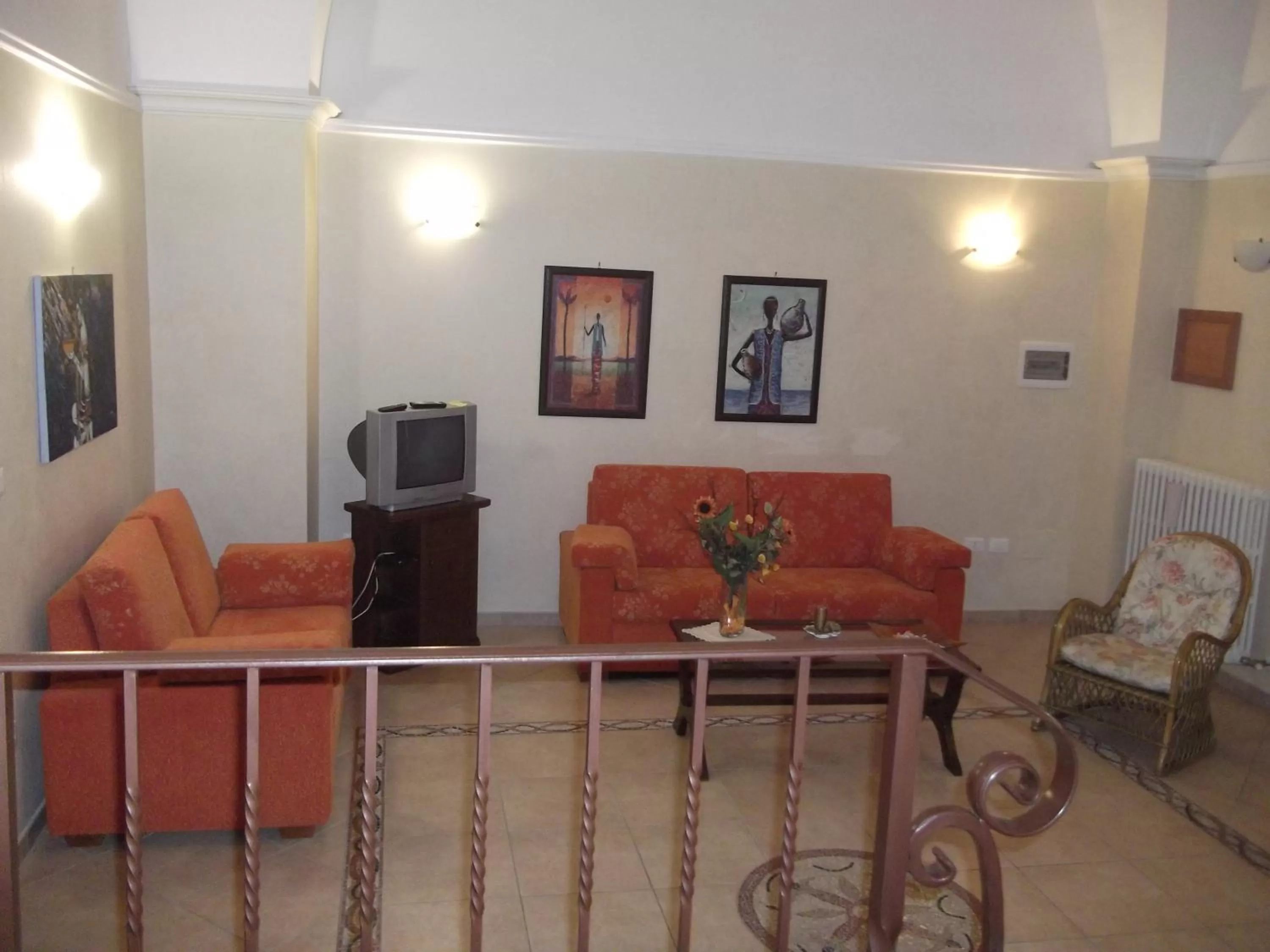 Communal lounge/ TV room in B&B La Corte