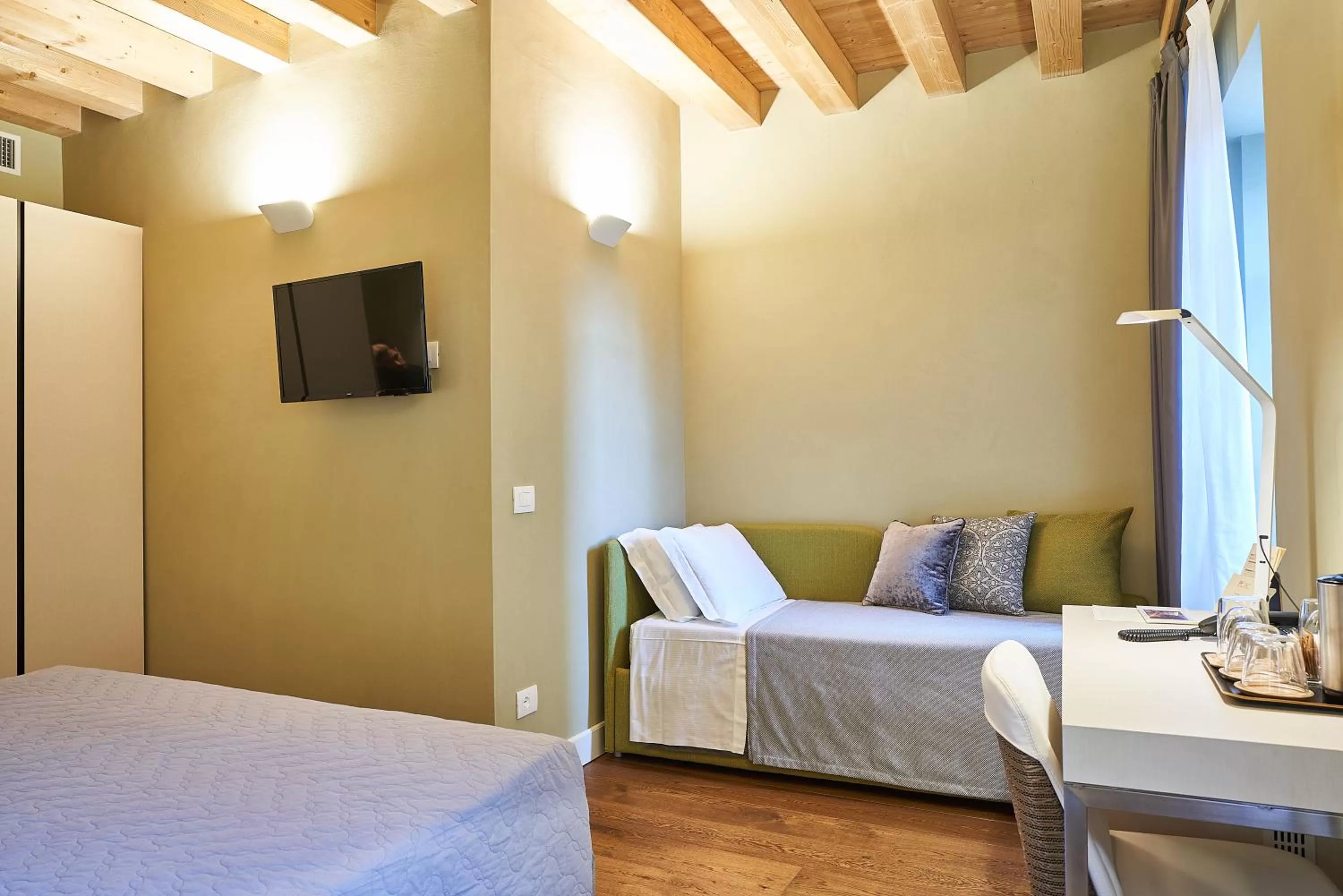 Bed in Locanda delle Mercanzie