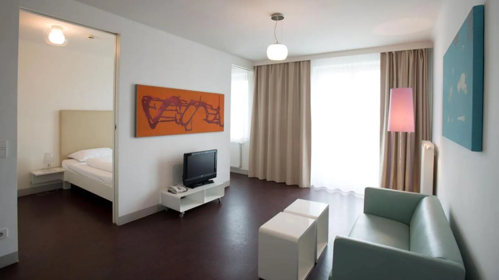 Living room, Bed in Stanys - Das Apartmenthotel