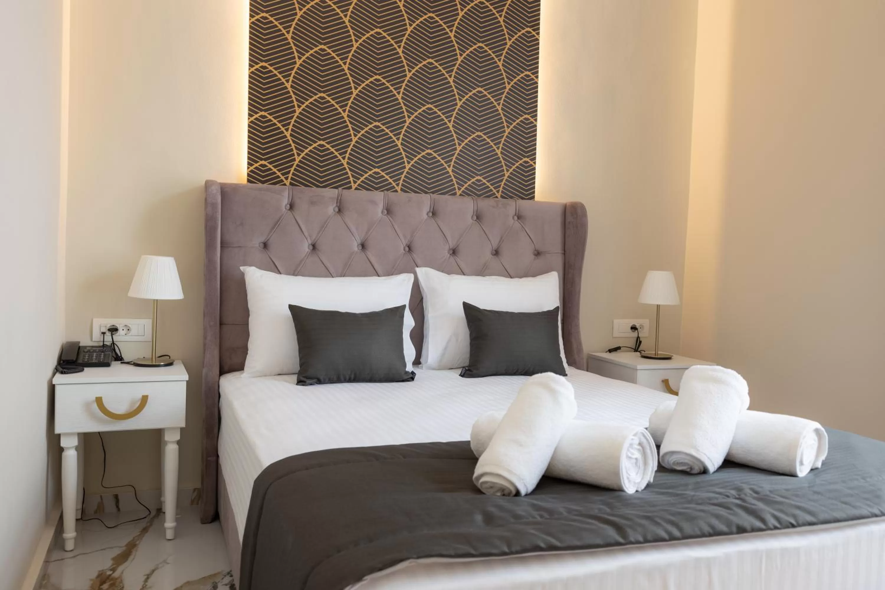 Bed in Modern Revival Luxury Hotel