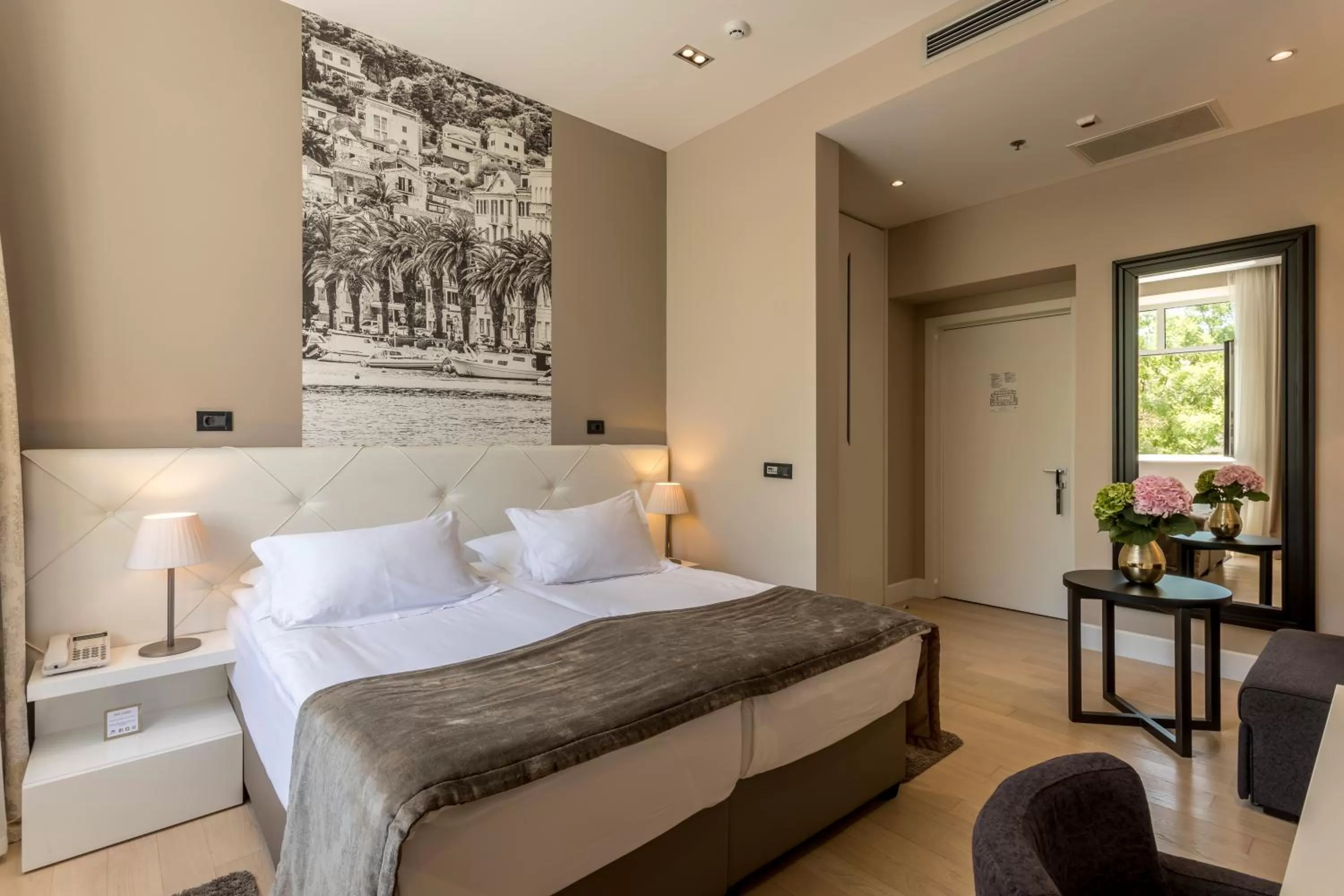 Bed in Cornaro Hotel