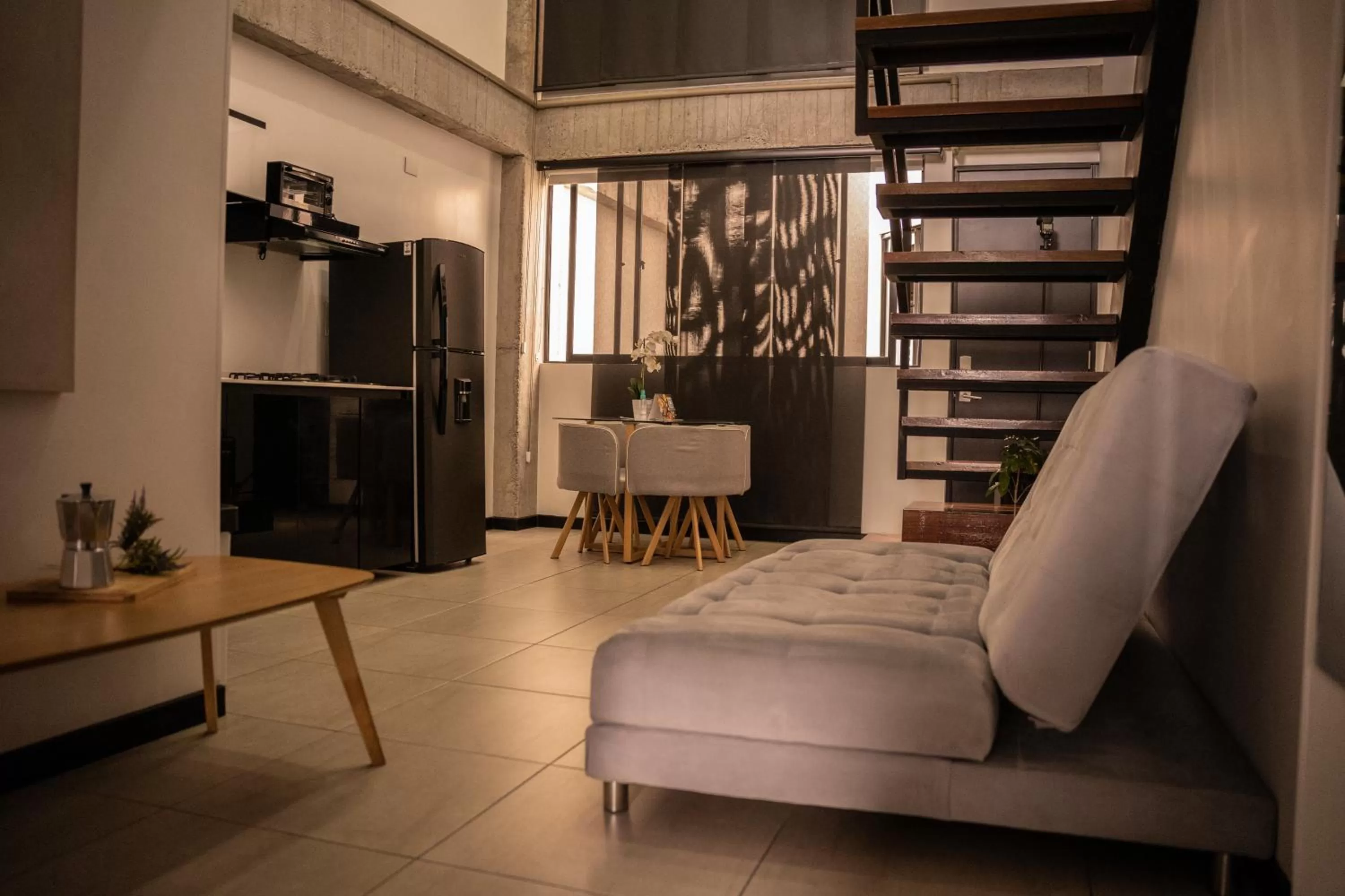 Kitchen or kitchenette, Bed in The Coffee Club Apartahotel