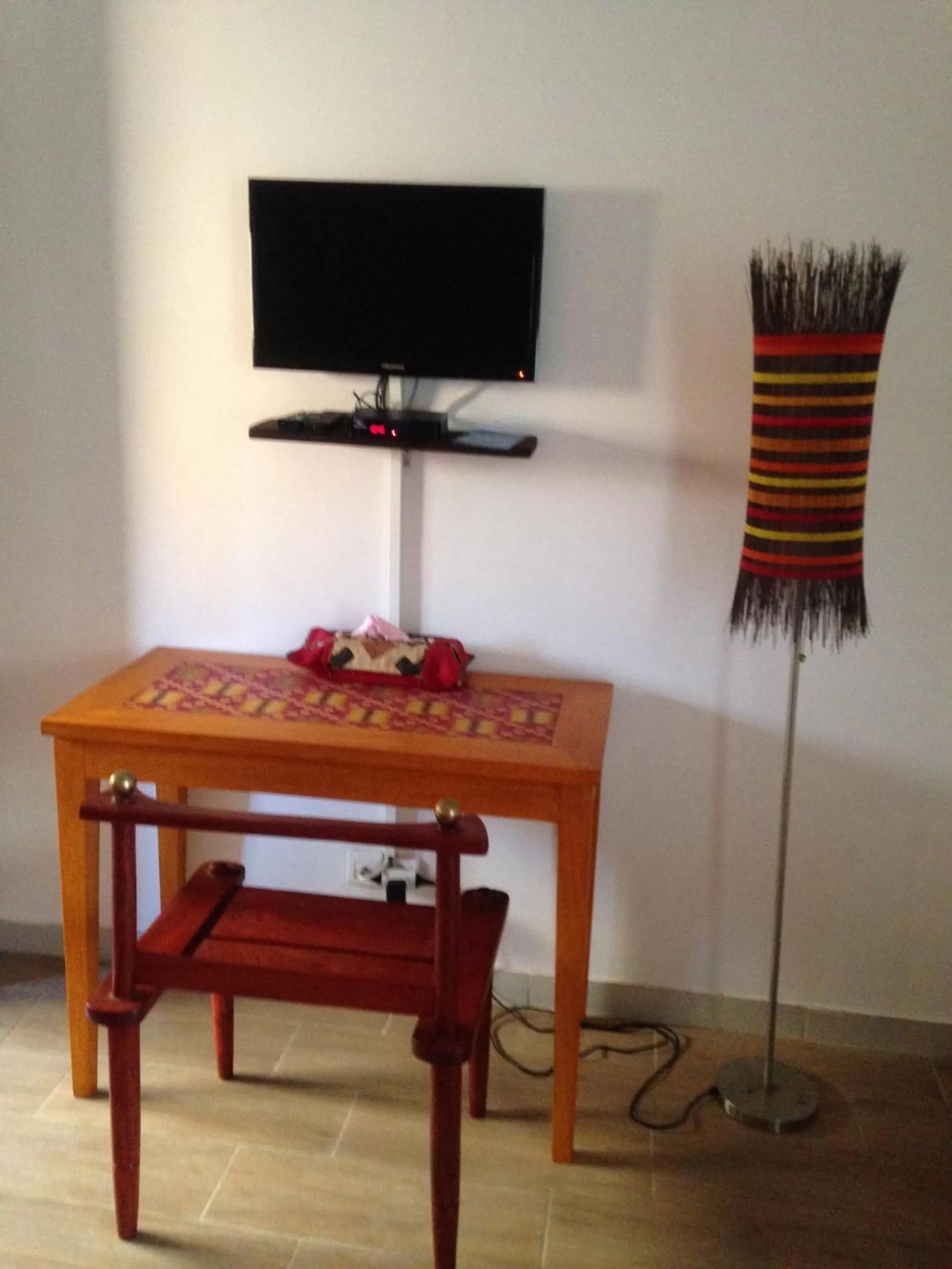 Decorative detail, TV/Entertainment Center in Nyéléni maison sahel