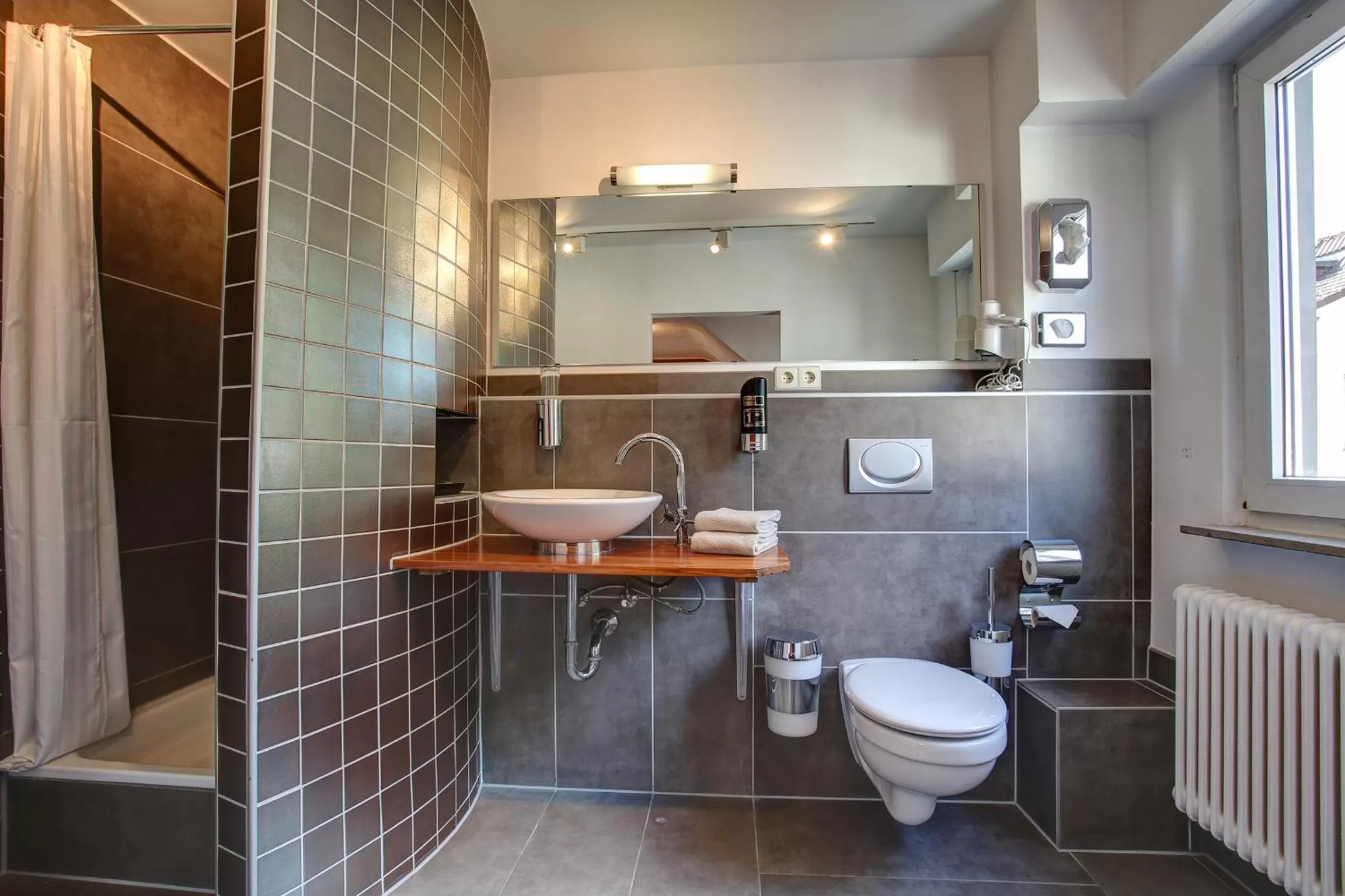 Bathroom in Hafner Hotel- Apartment