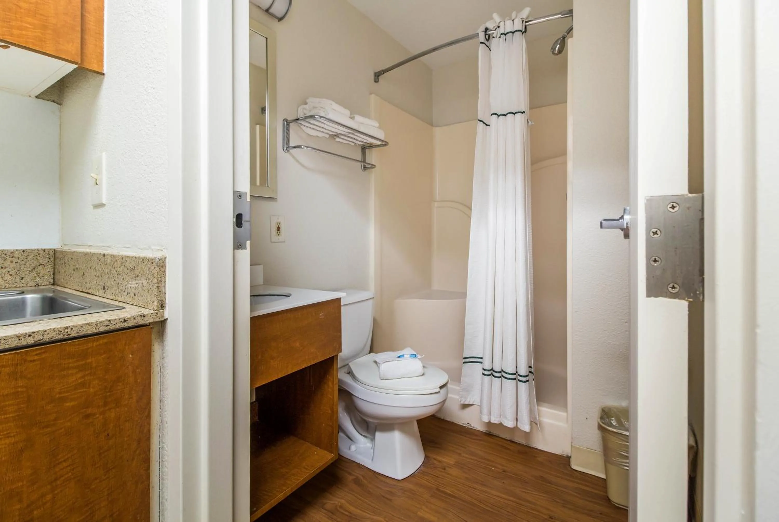 Bathroom in HomeTowne Studios by Red Roof Houston - Northwest