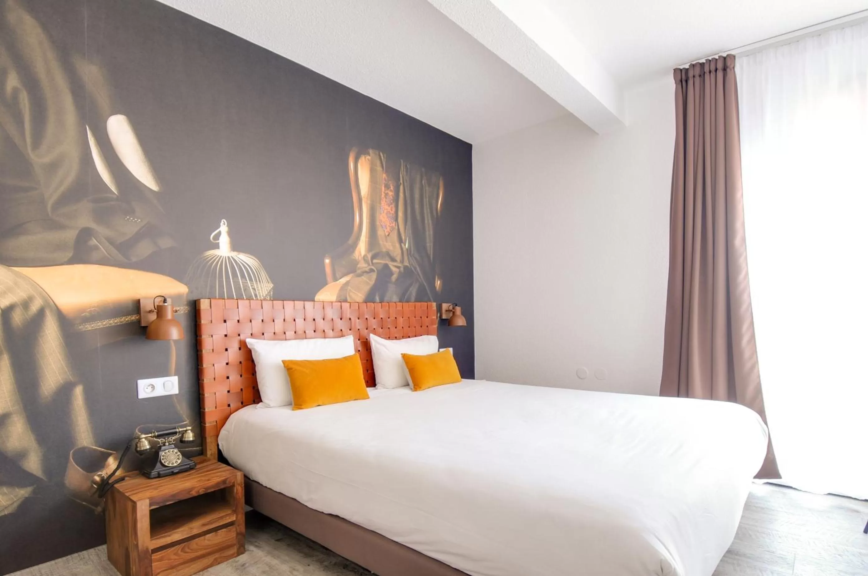 Bedroom in La Maison Hôtel Mulhouse Centre