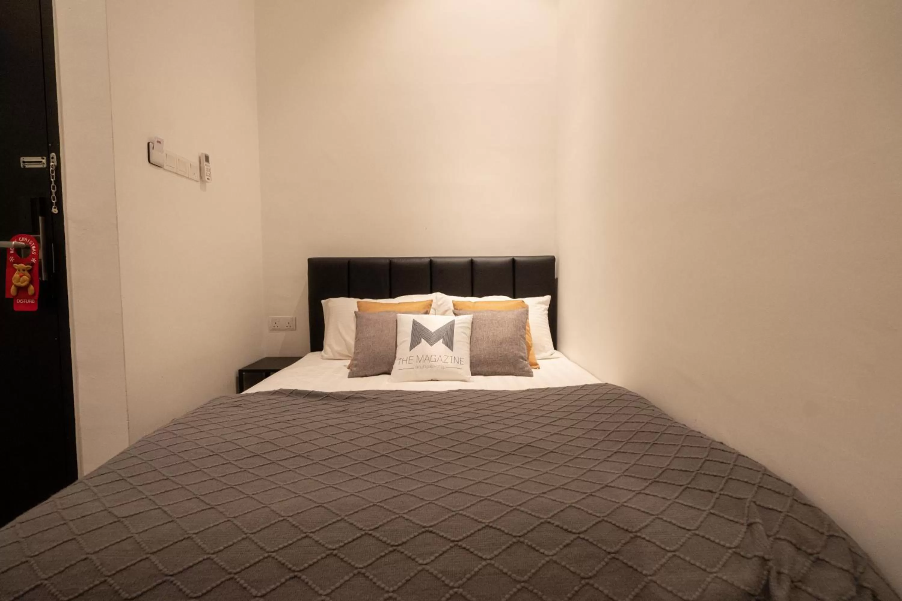 Bed in The Magazine Boutique Hotel