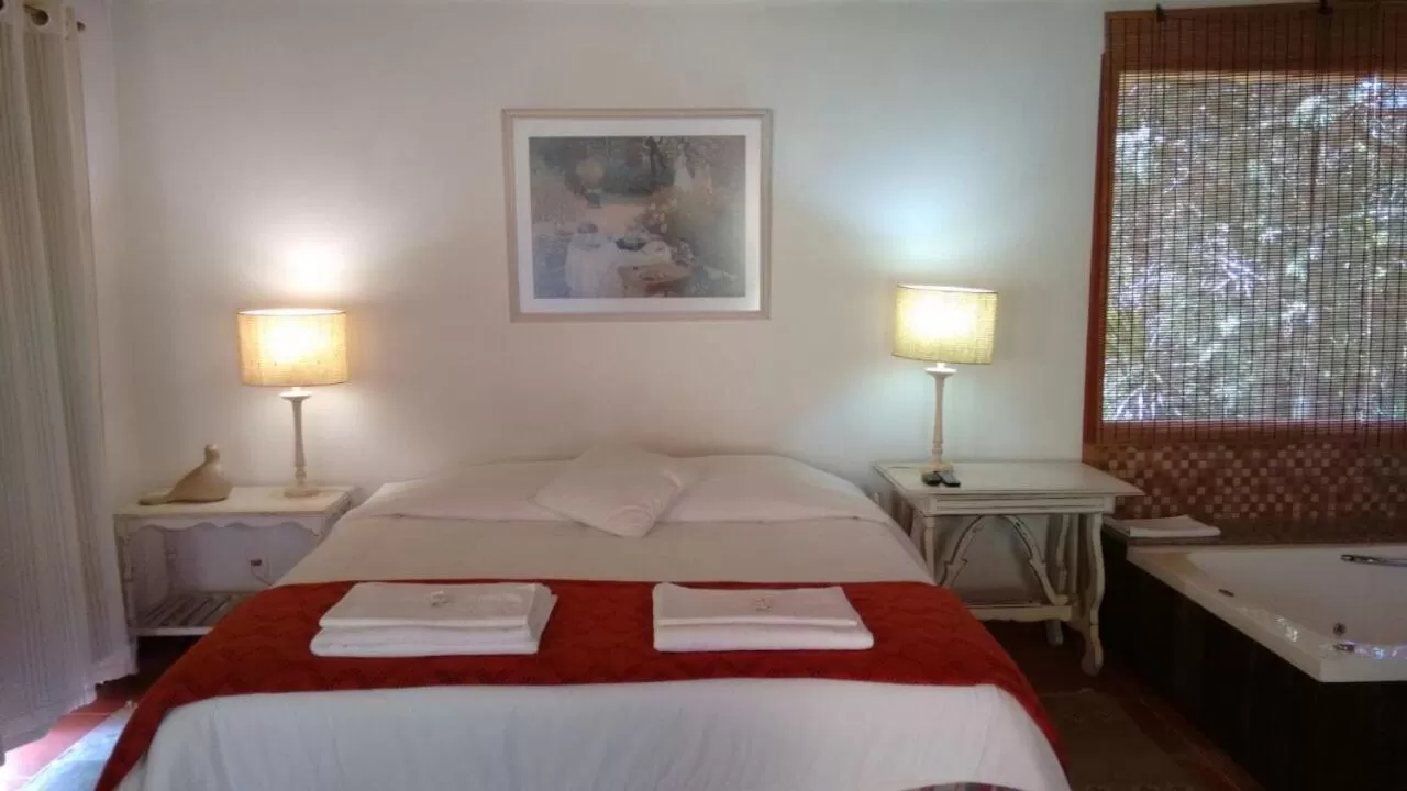 Bed in Pousada Mariza