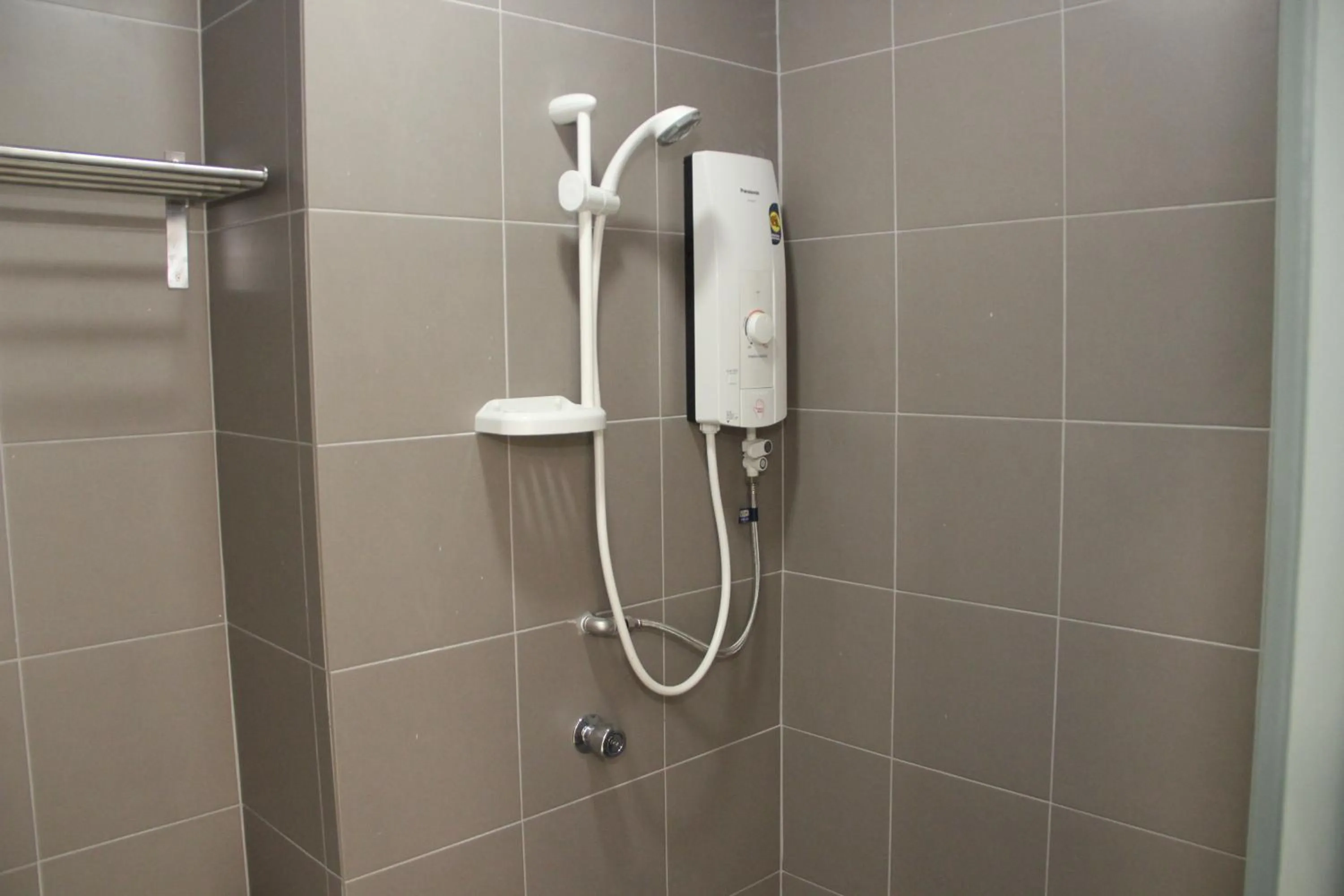 Shower in Summer Suites Residences by Subhome