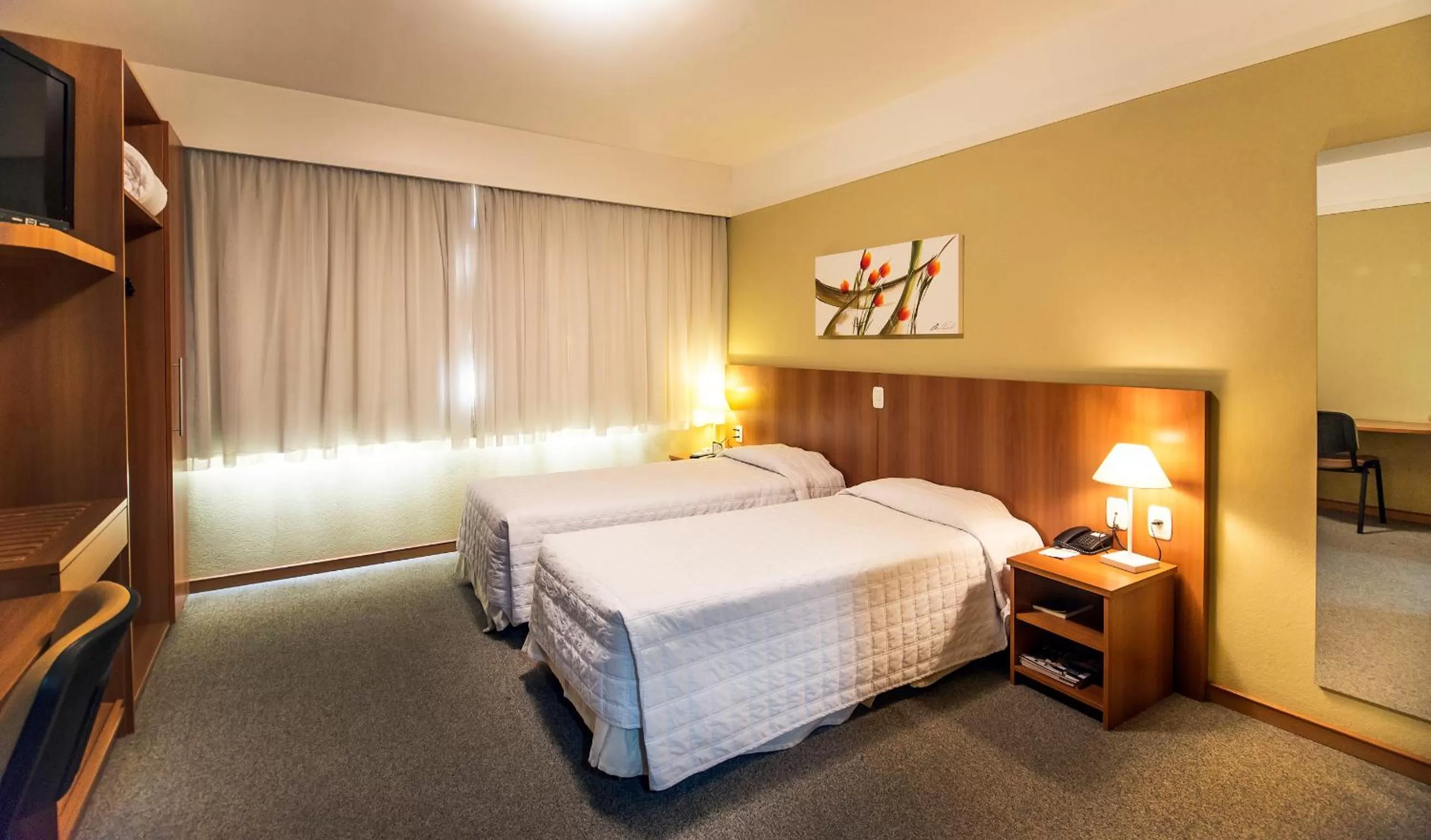 Bed in Tri Hotel Executive Caxias