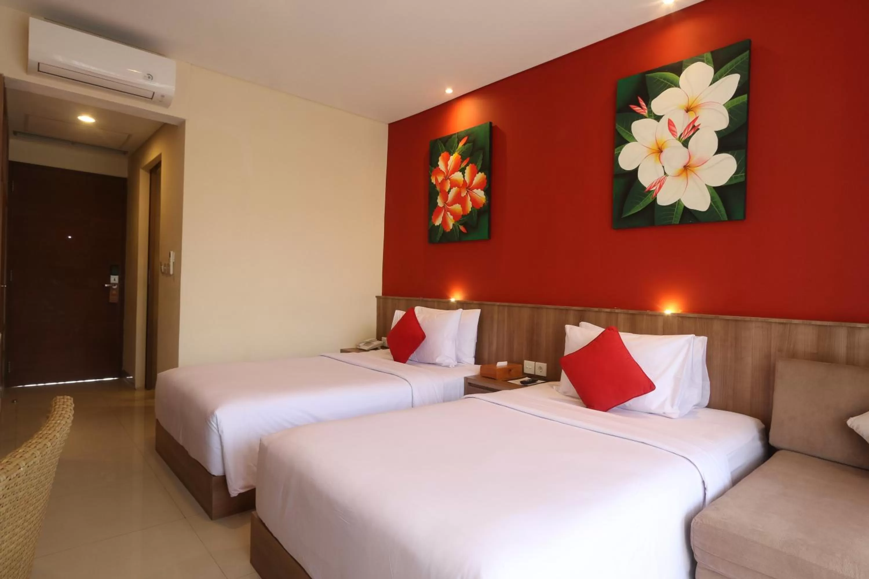 Bed in Grand La Walon Hotel