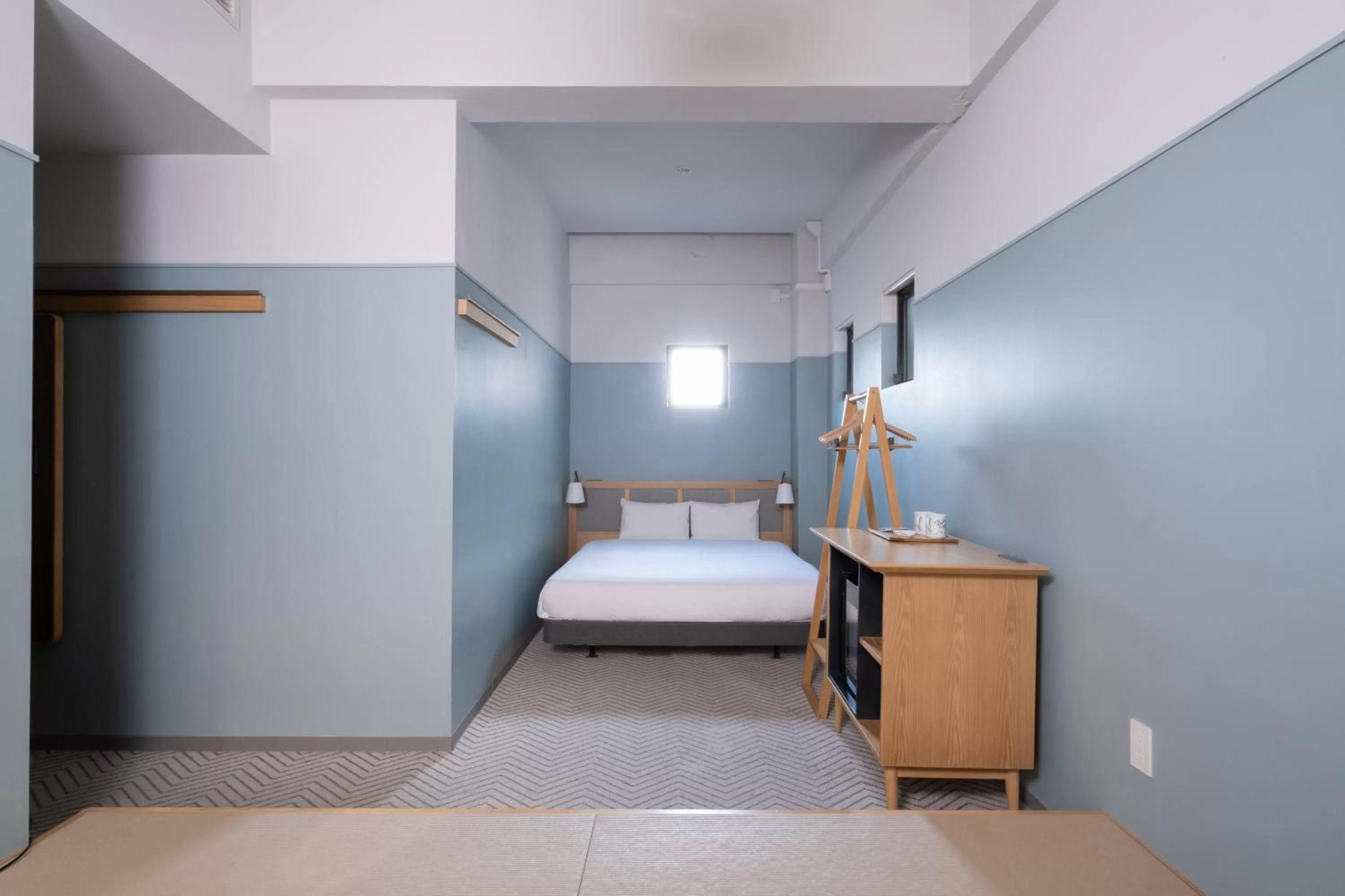 Photo of the whole room, Bed in RAKURO Kyoto by THE SHARE HOTELS