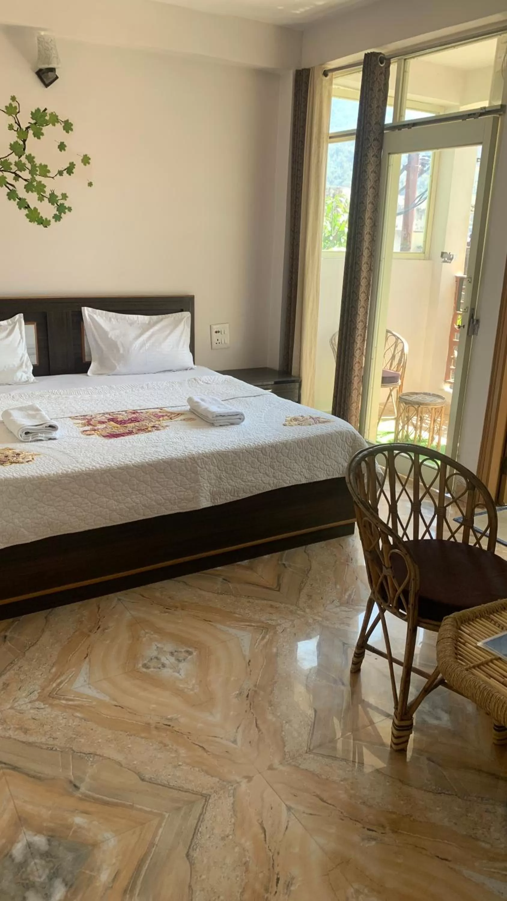 Bed in Rudram Hotel Yoga & Ayurveda Retreat