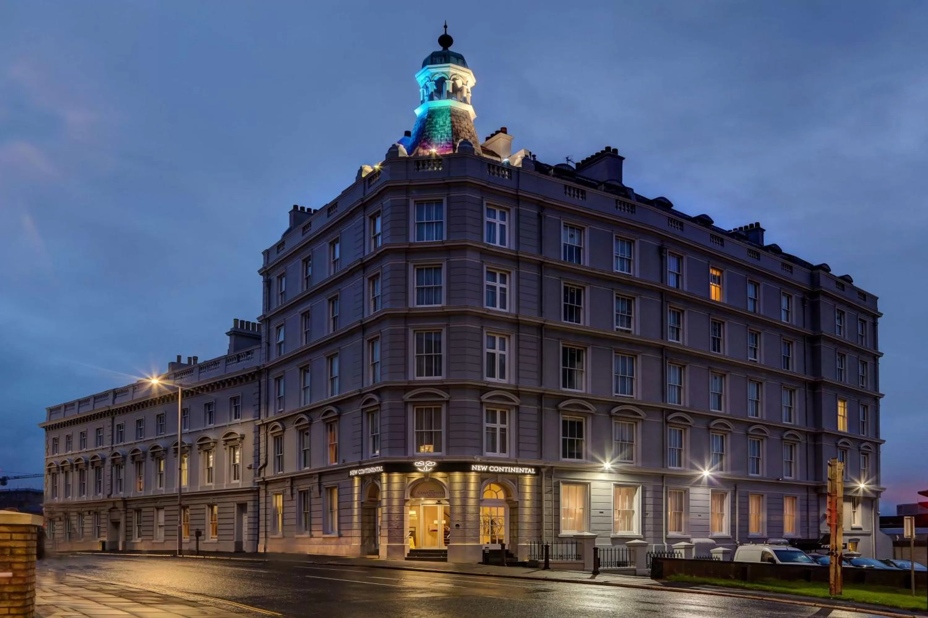 Property building in New Continental Hotel; Sure Hotel Collection by Best Western