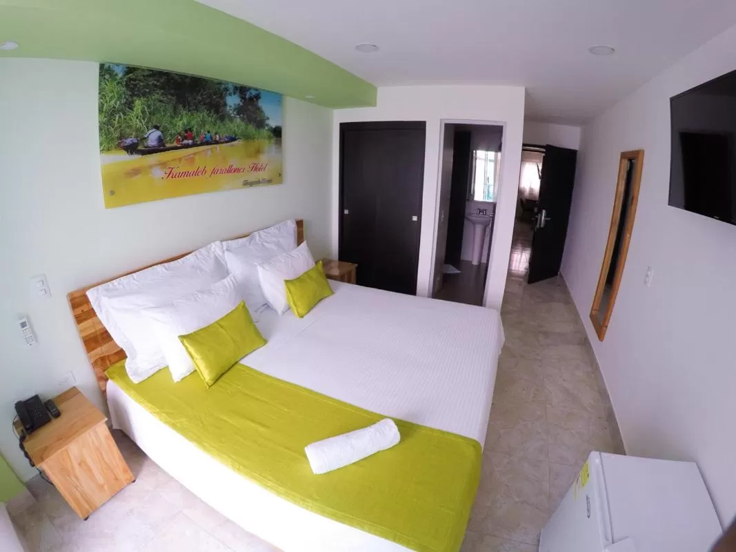 Bed in Kamaleb Farallones Hotel