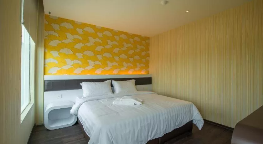 Bed in Riverfront Boutique Hotel