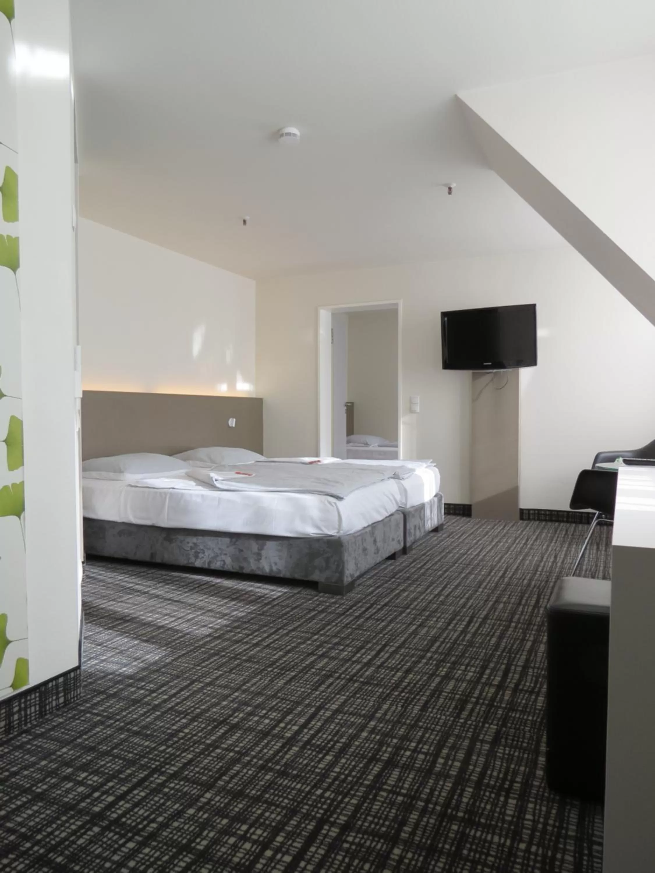 Bed in Comfor Hotel Ulm City