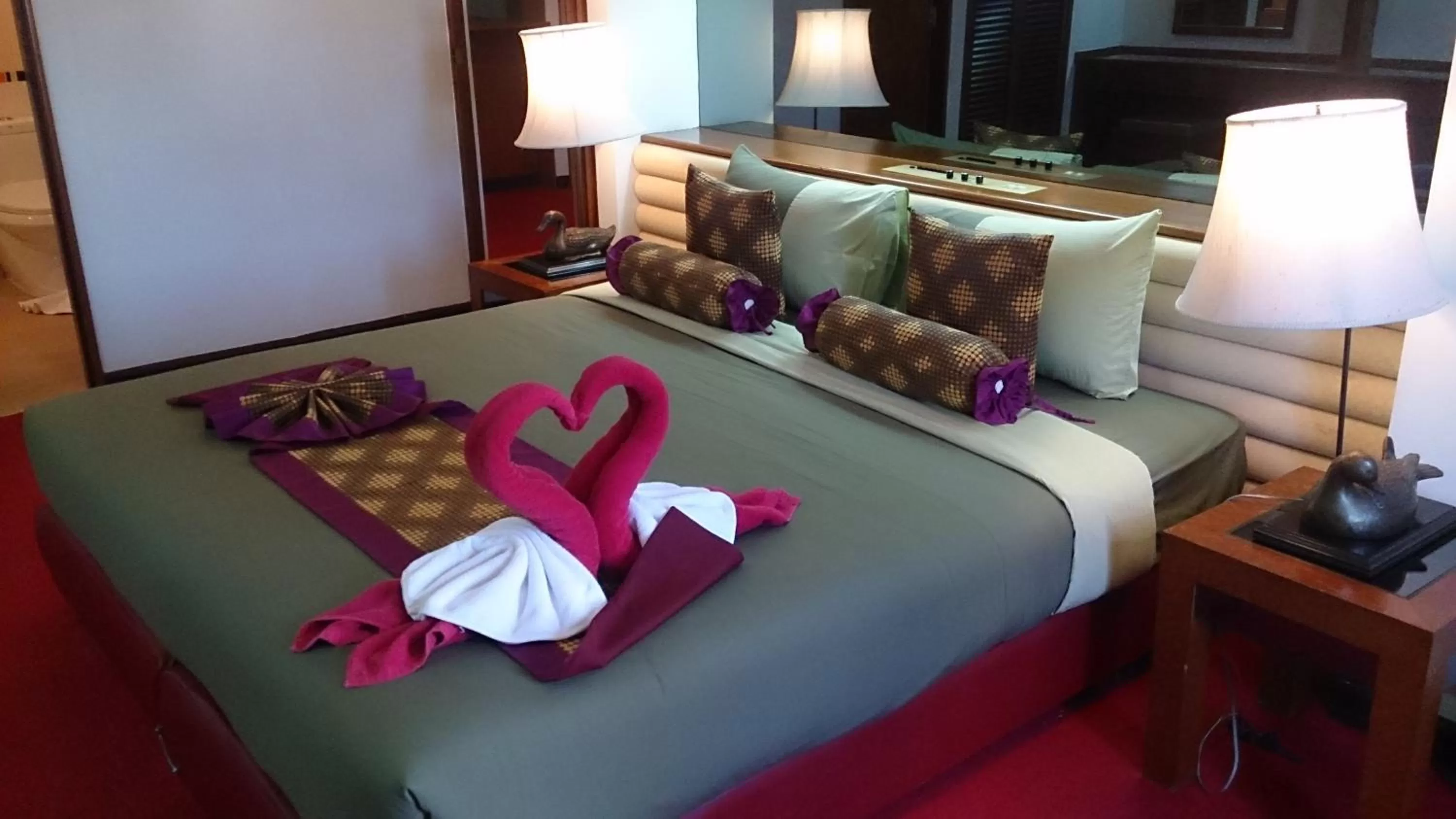 Bed in The Camelot Hotel Pattaya