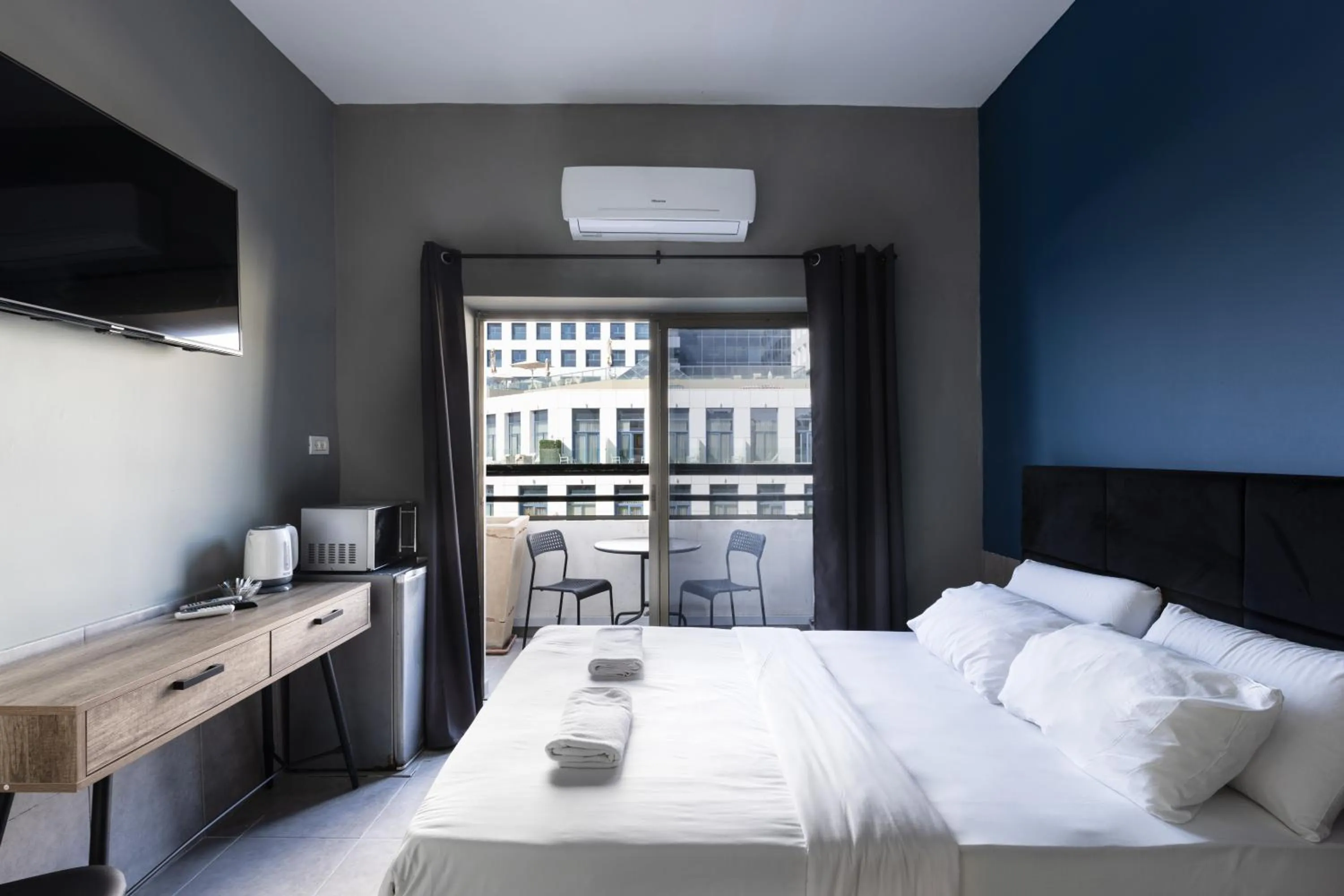 Photo of the whole room, Bed in Liber Tel Aviv Sea Shore Suites BY RAPHAEL HOTELS