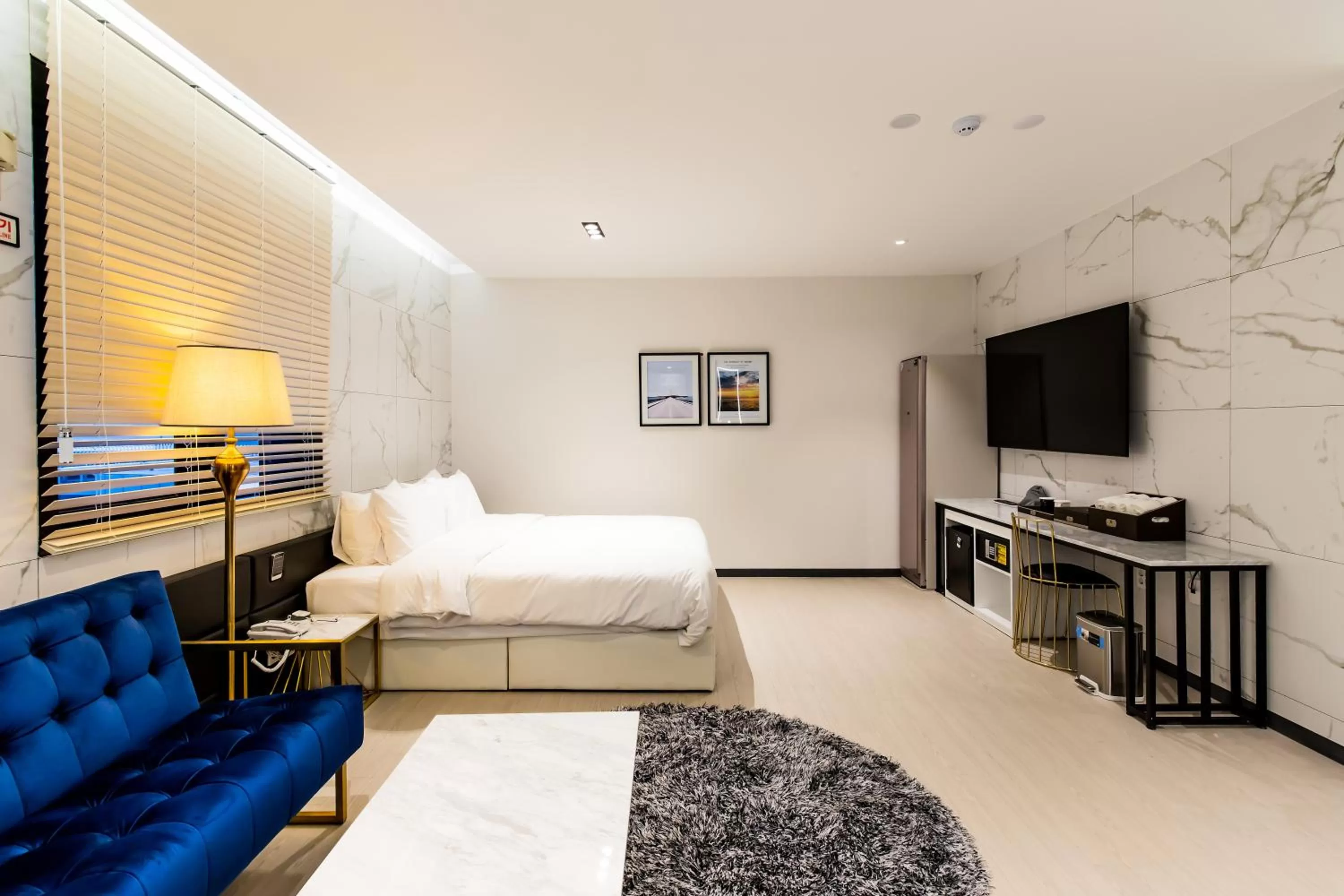 Photo of the whole room, Bed in Air Sky Hotel