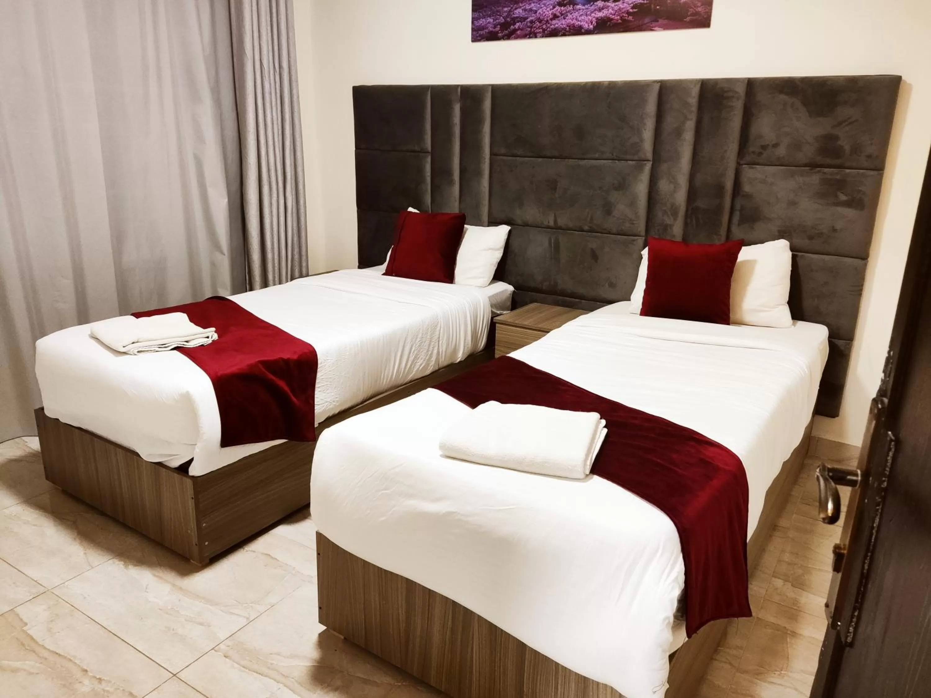 Bed in Golden Plaza Hotel