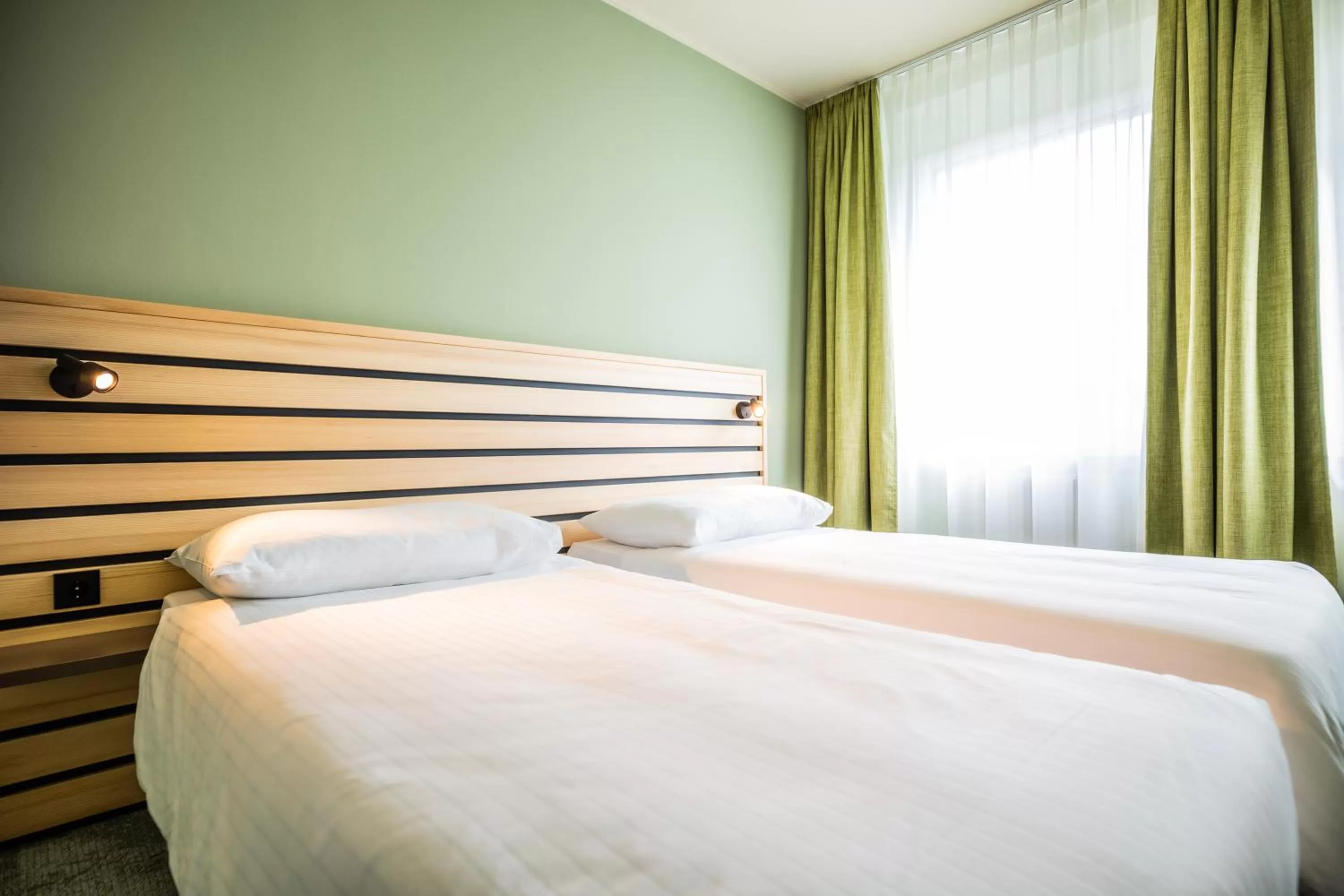 Bedroom, Bed in flexymotel Spielberg