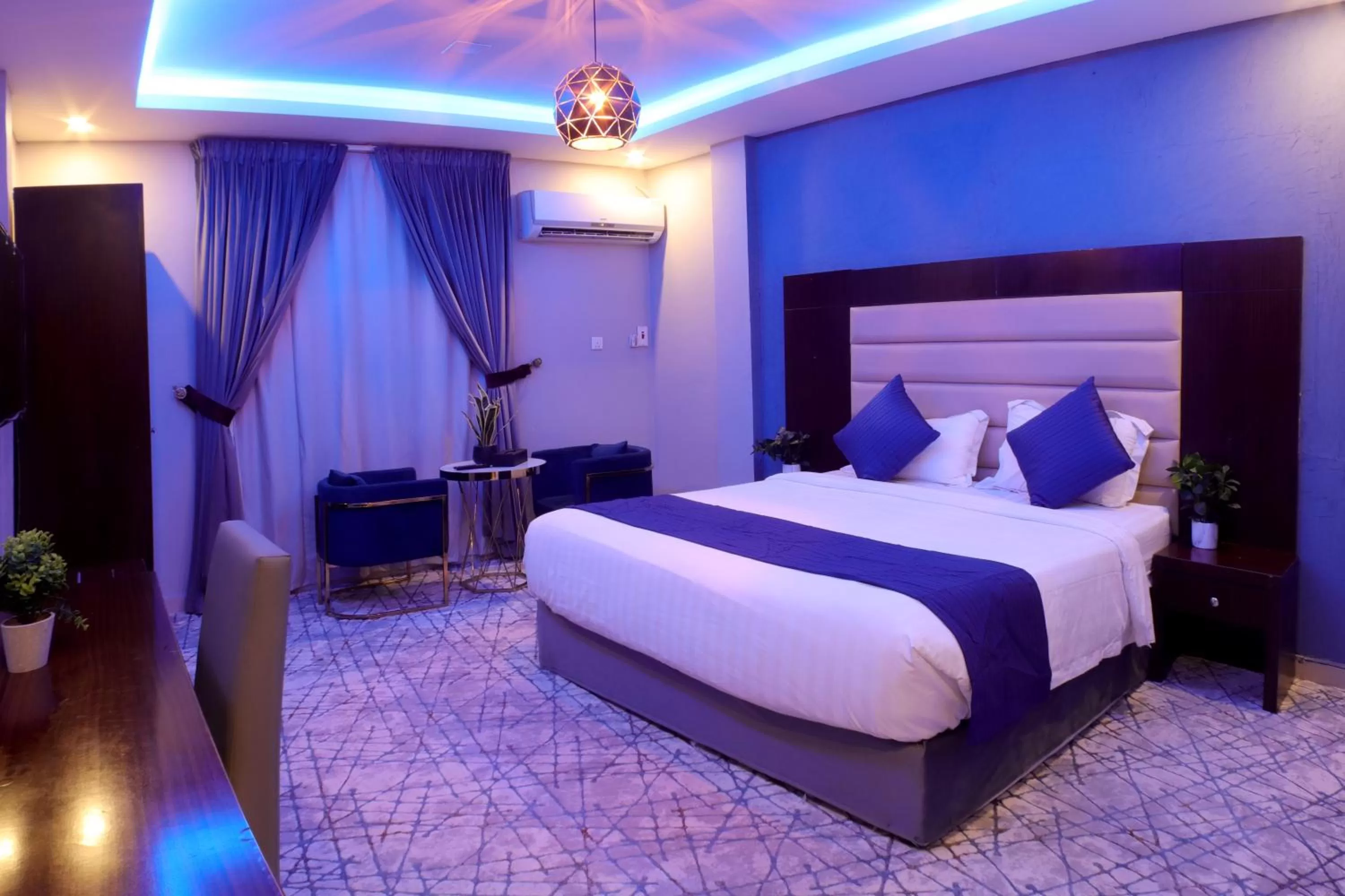 Bed in Maskan Al Dyafah Hotel Apartments