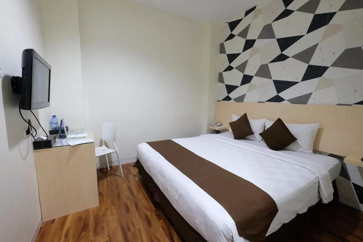 Bedroom, Bed in Hotel 88 Mangga Besar Raya 120 Jakarta By WH