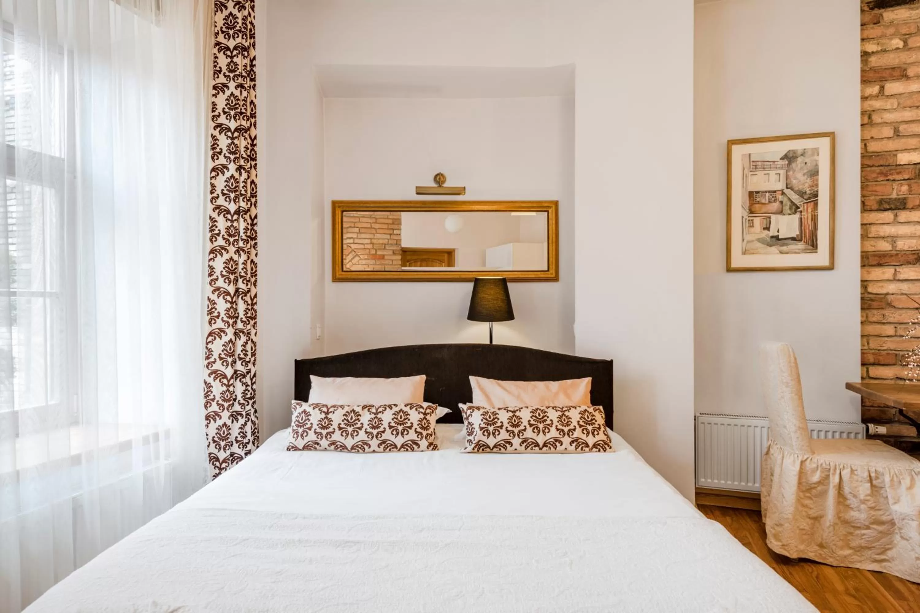 Bed in Vilnius Apartments