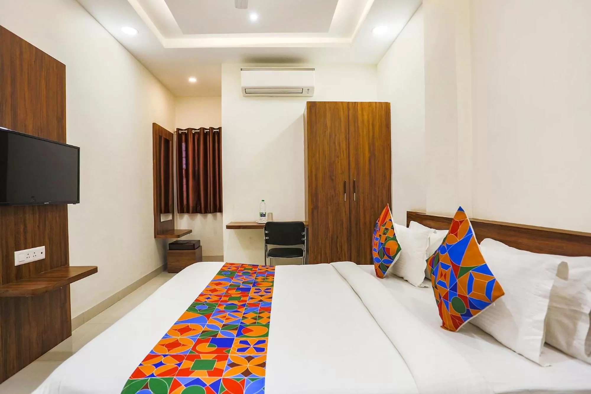 Bed in FabHotel Balaji Paradise