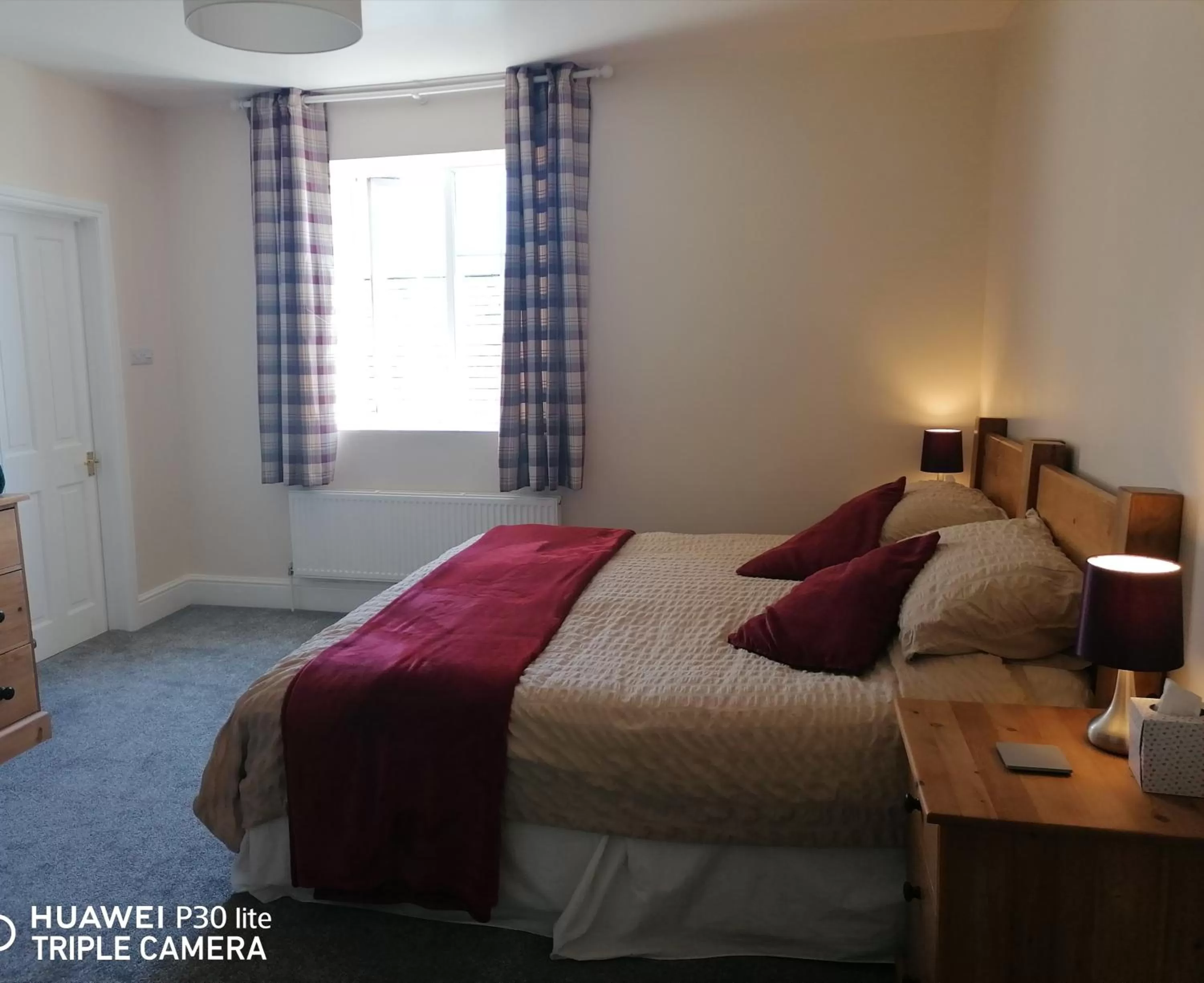 Bed in Lovaton Farmhouse