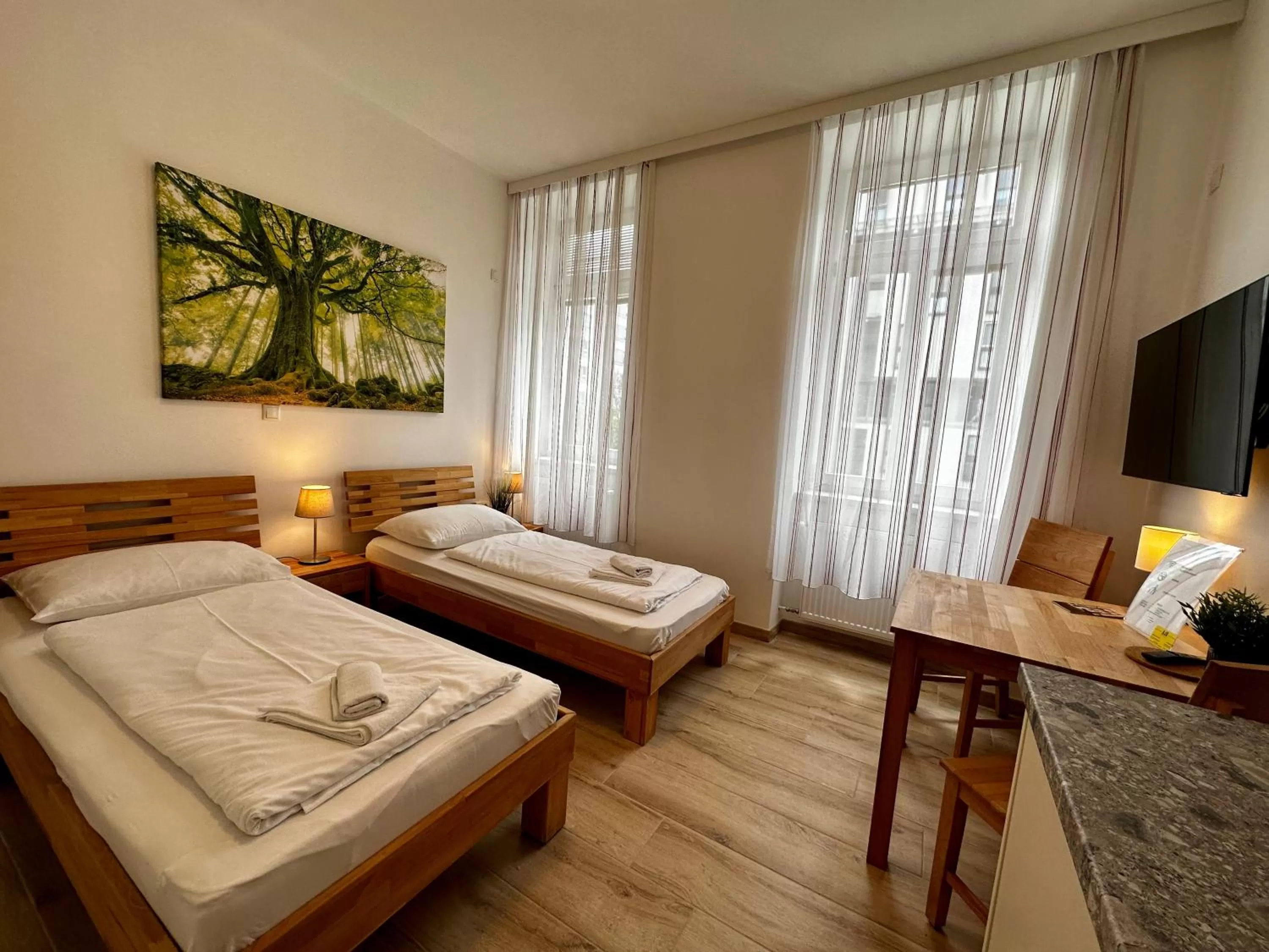 Photo of the whole room, Bed in AJO Apartments - Messe City Flat - Self-Check-in