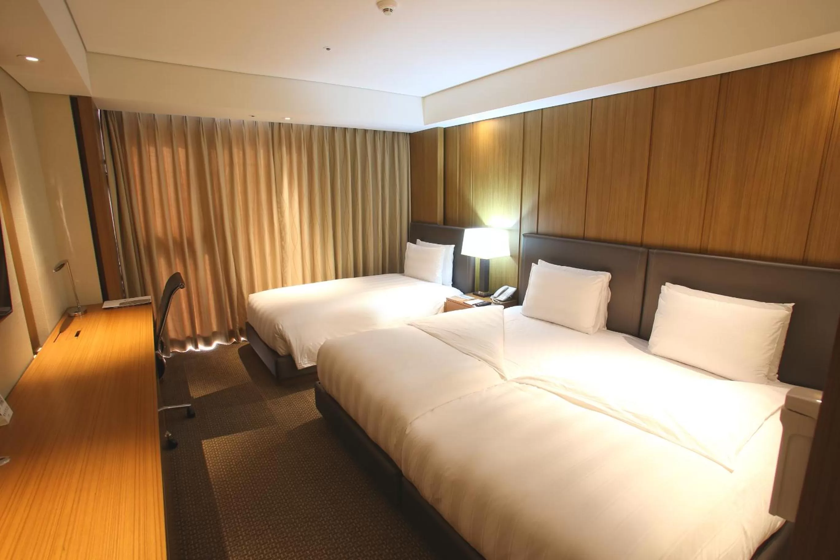 Bed in LOTTE CITY HOTEL Daejeon