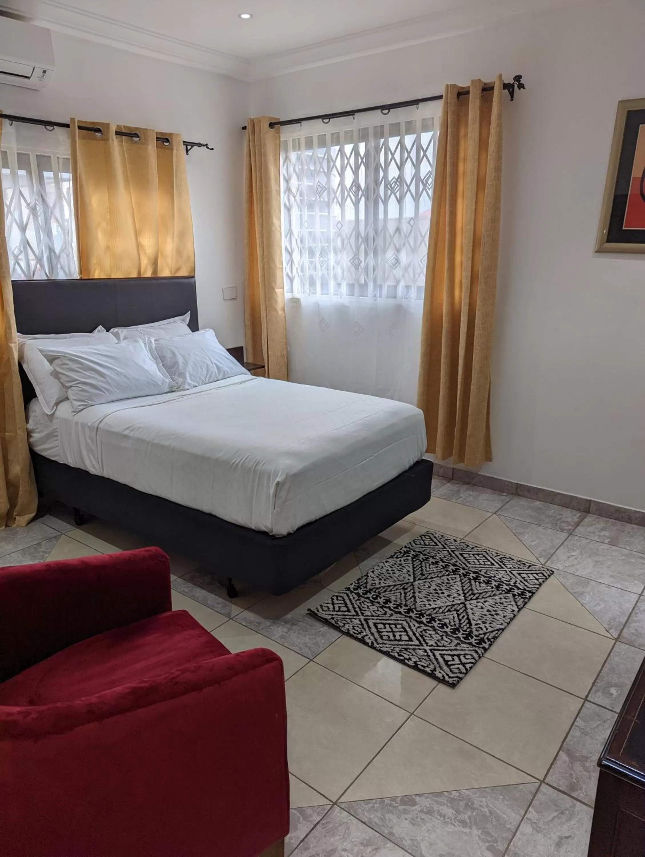 Bed in KoKo Palm Inn LTD