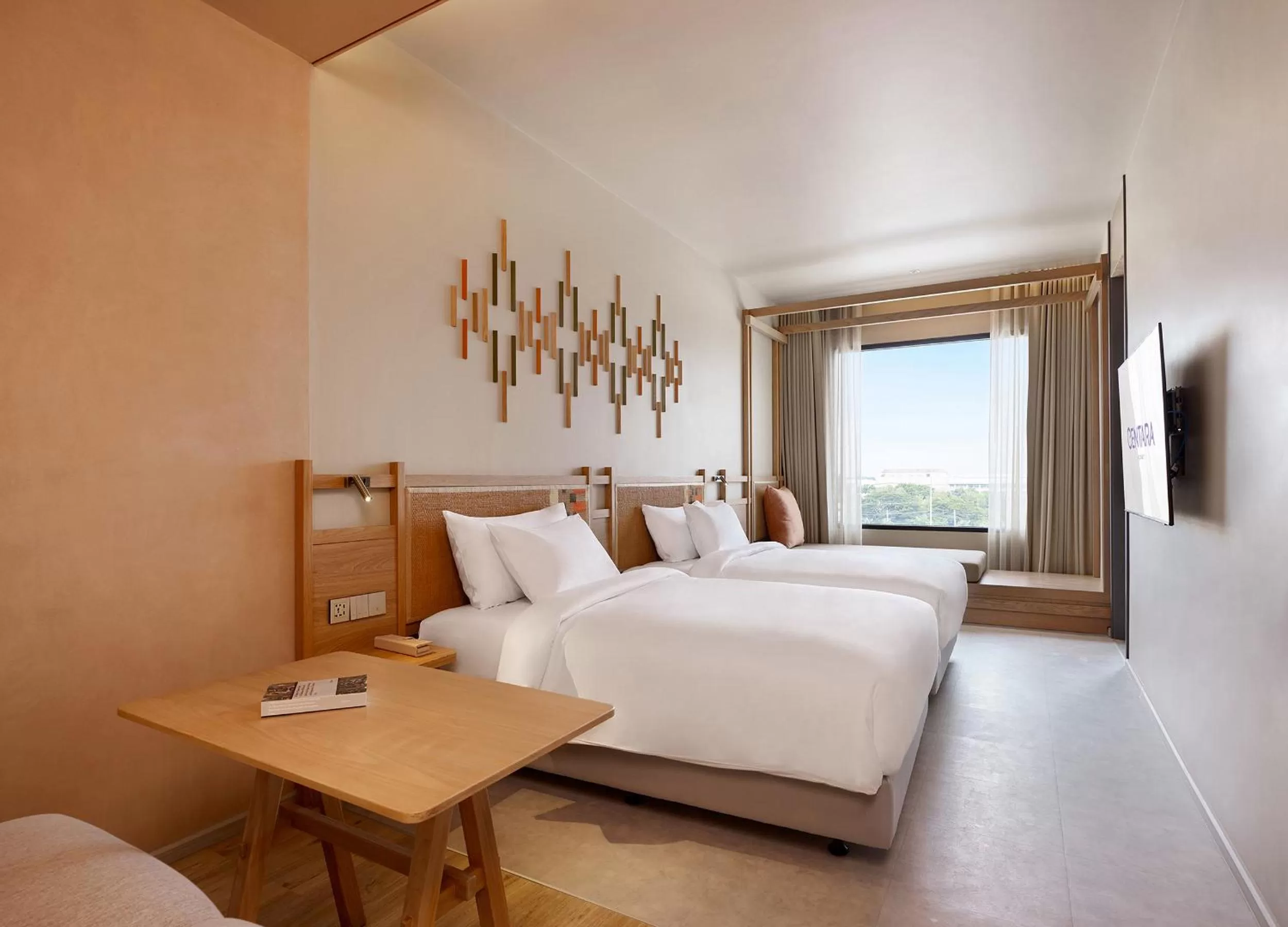 Seating area, Bed in Centara Korat