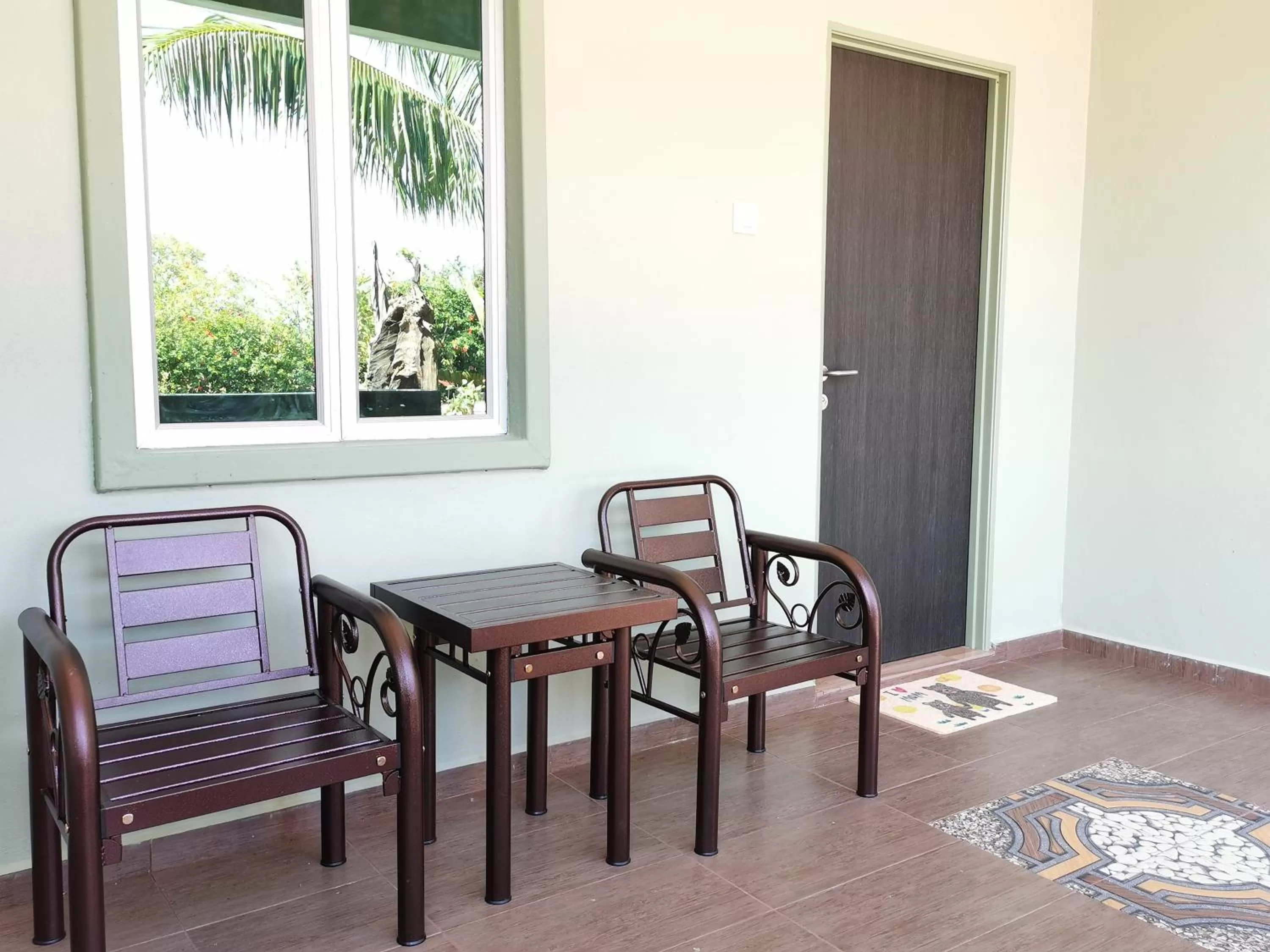 Seating area in Cenang Room Rahsia Motel