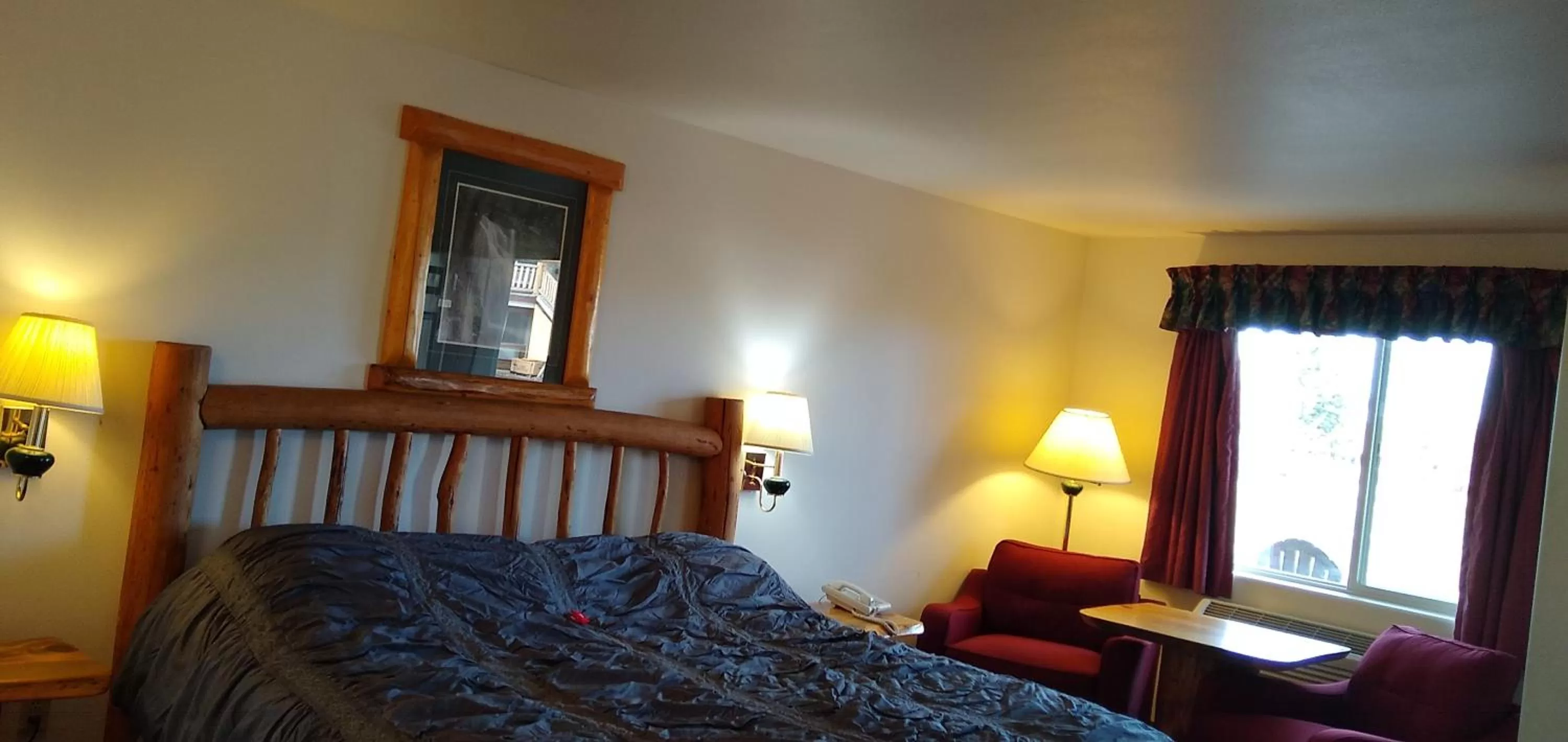 Bed in Ponderosa Motel